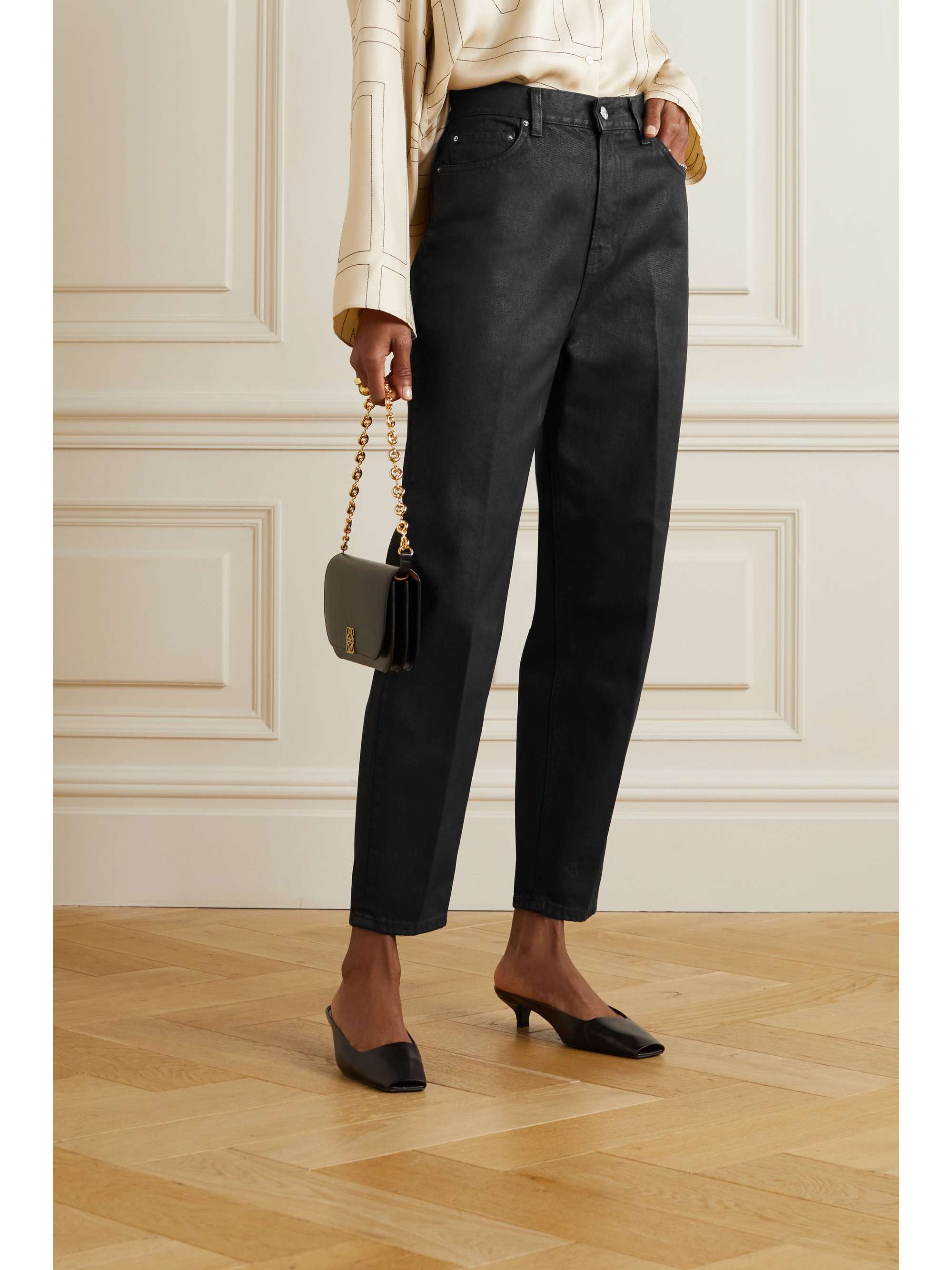 TOTEME Coated high-rise tapered jeans
