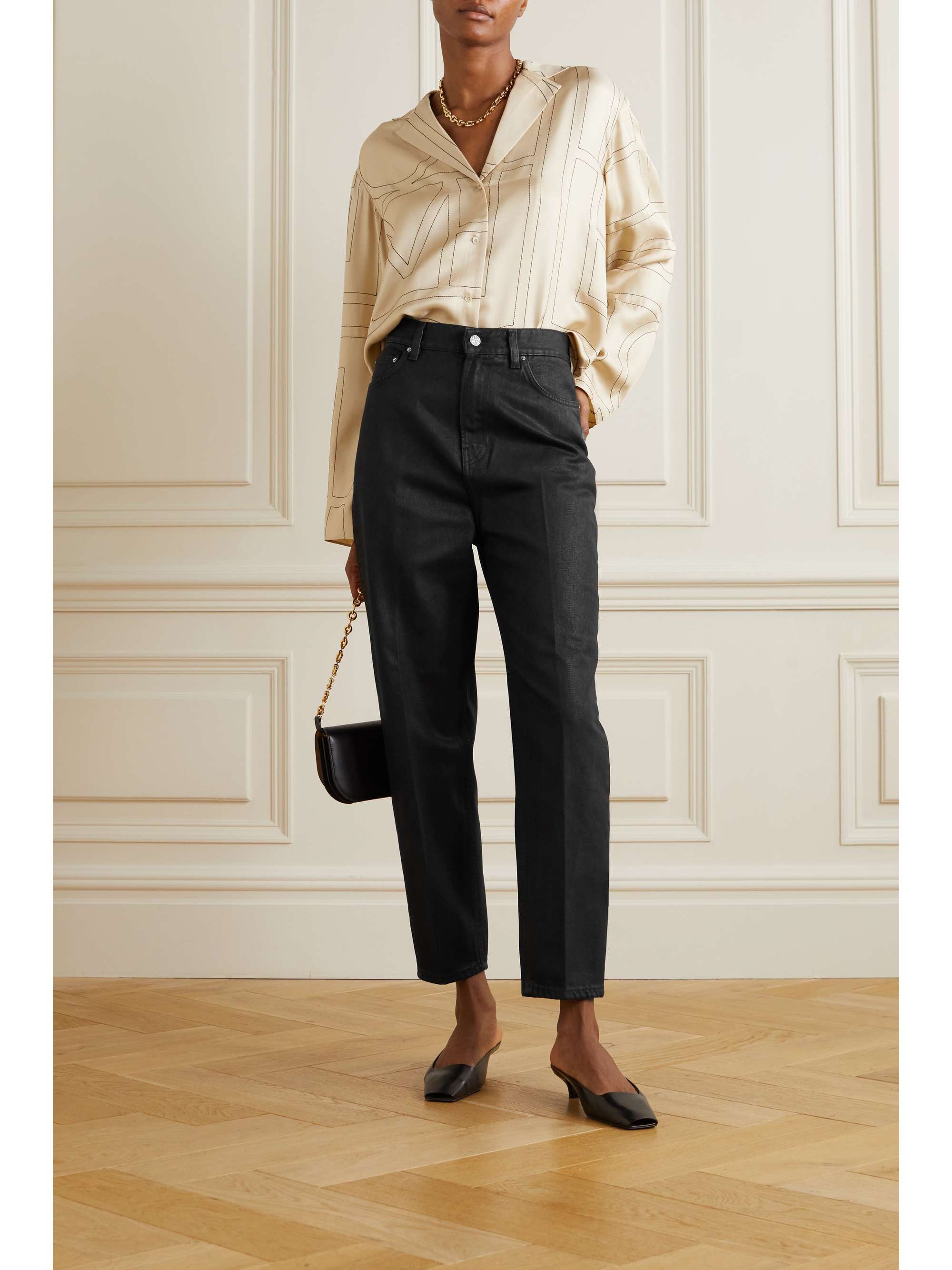 TOTEME Coated high-rise tapered jeans