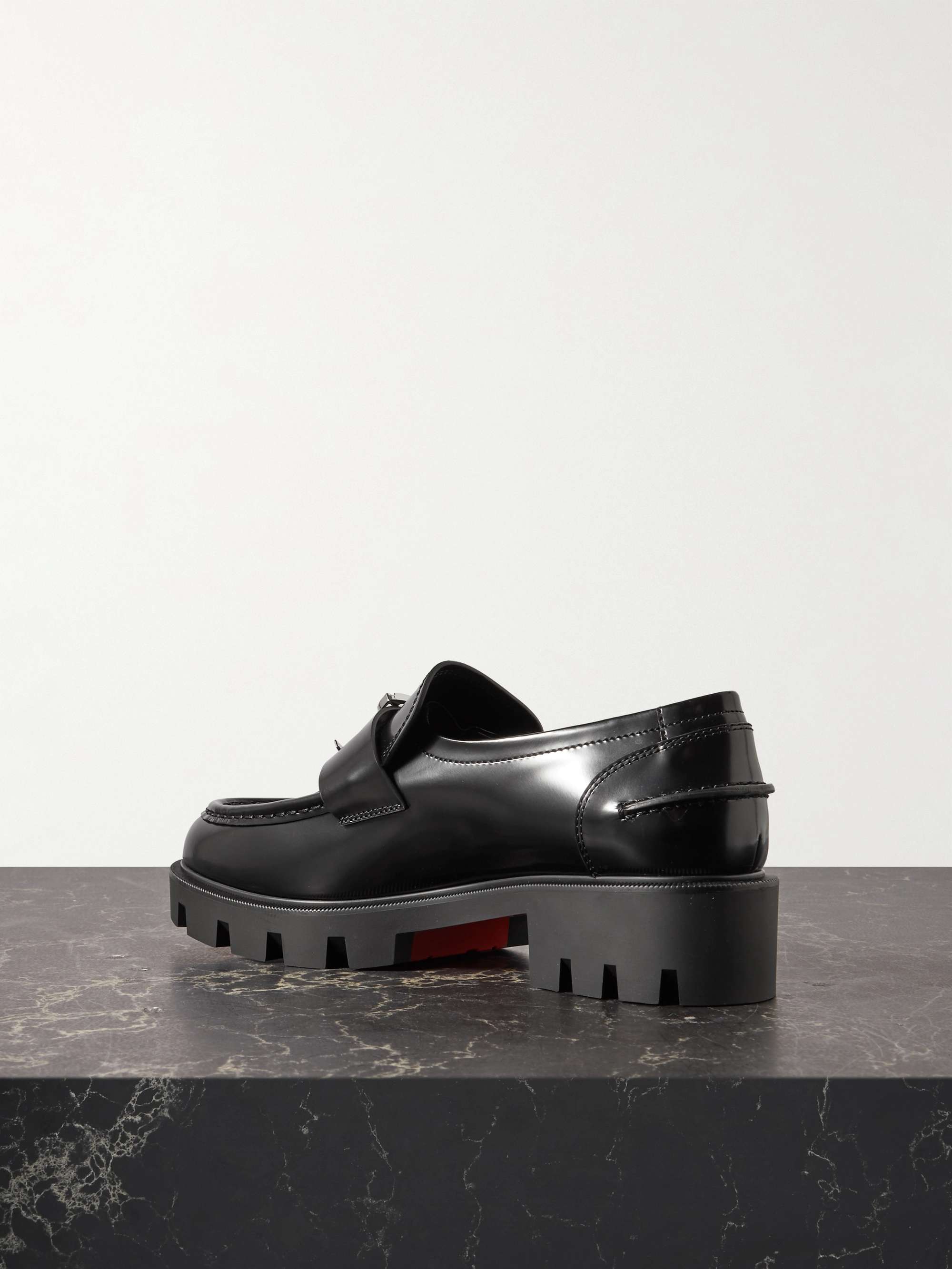 CHRISTIAN LOUBOUTIN CL Moc Lug embellished glossed-leather loafers