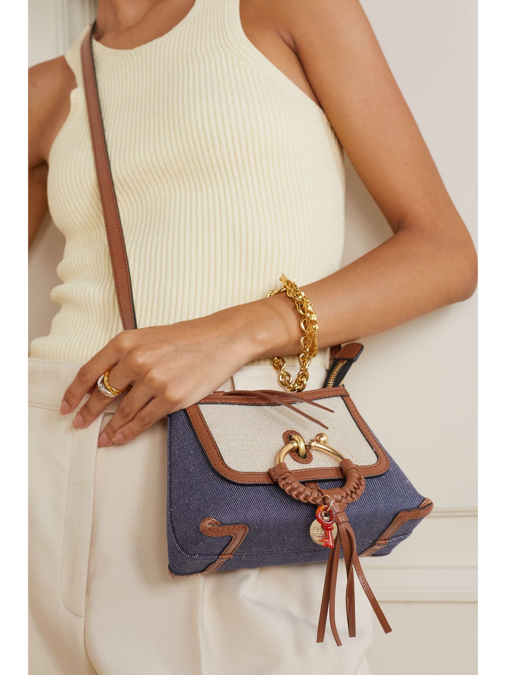 soho small studded leather and canvas shoulder bag