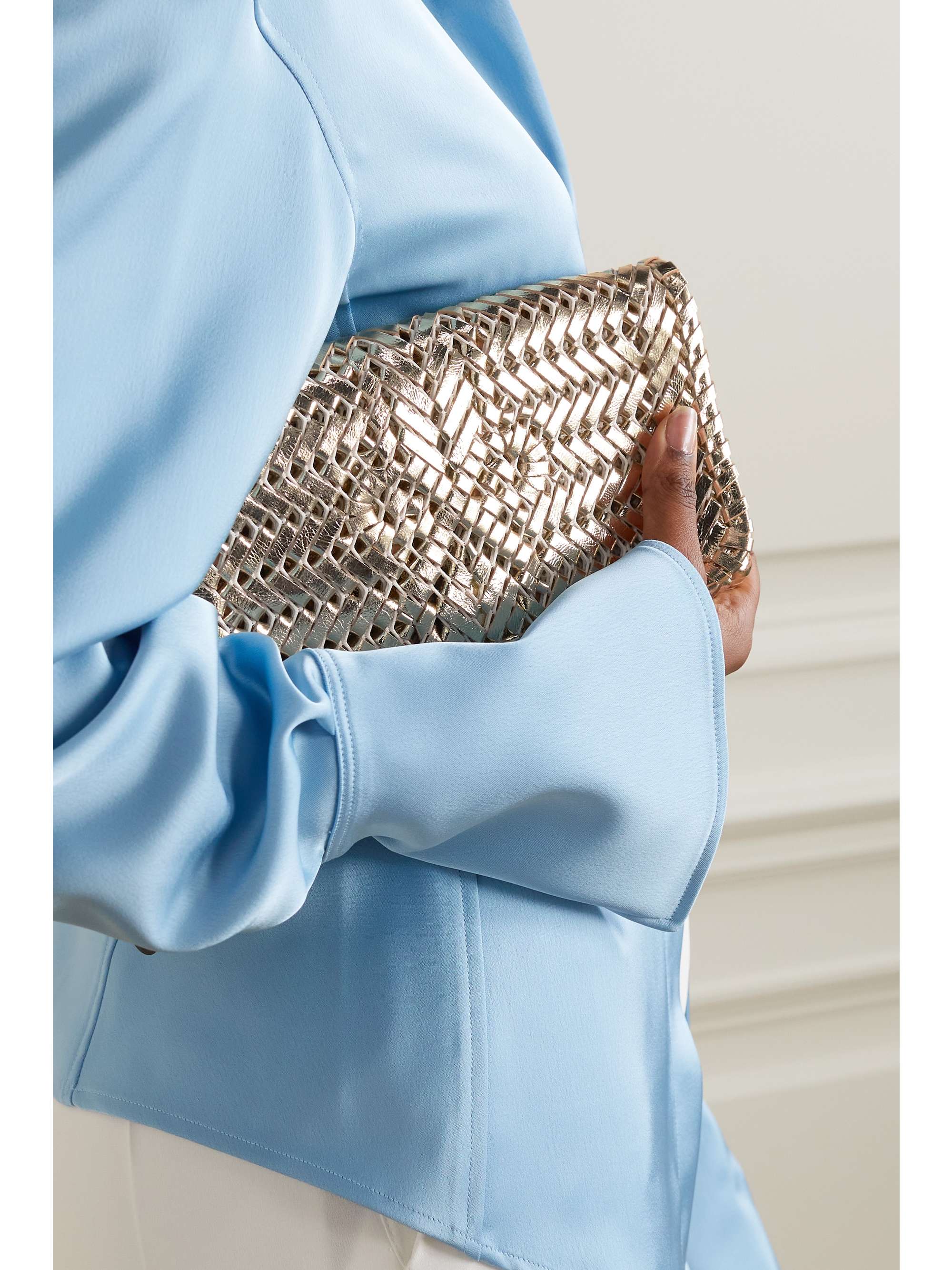 ANYA HINDMARCH + NET SUSTAIN The Neeson Tassel mini leather clutch
