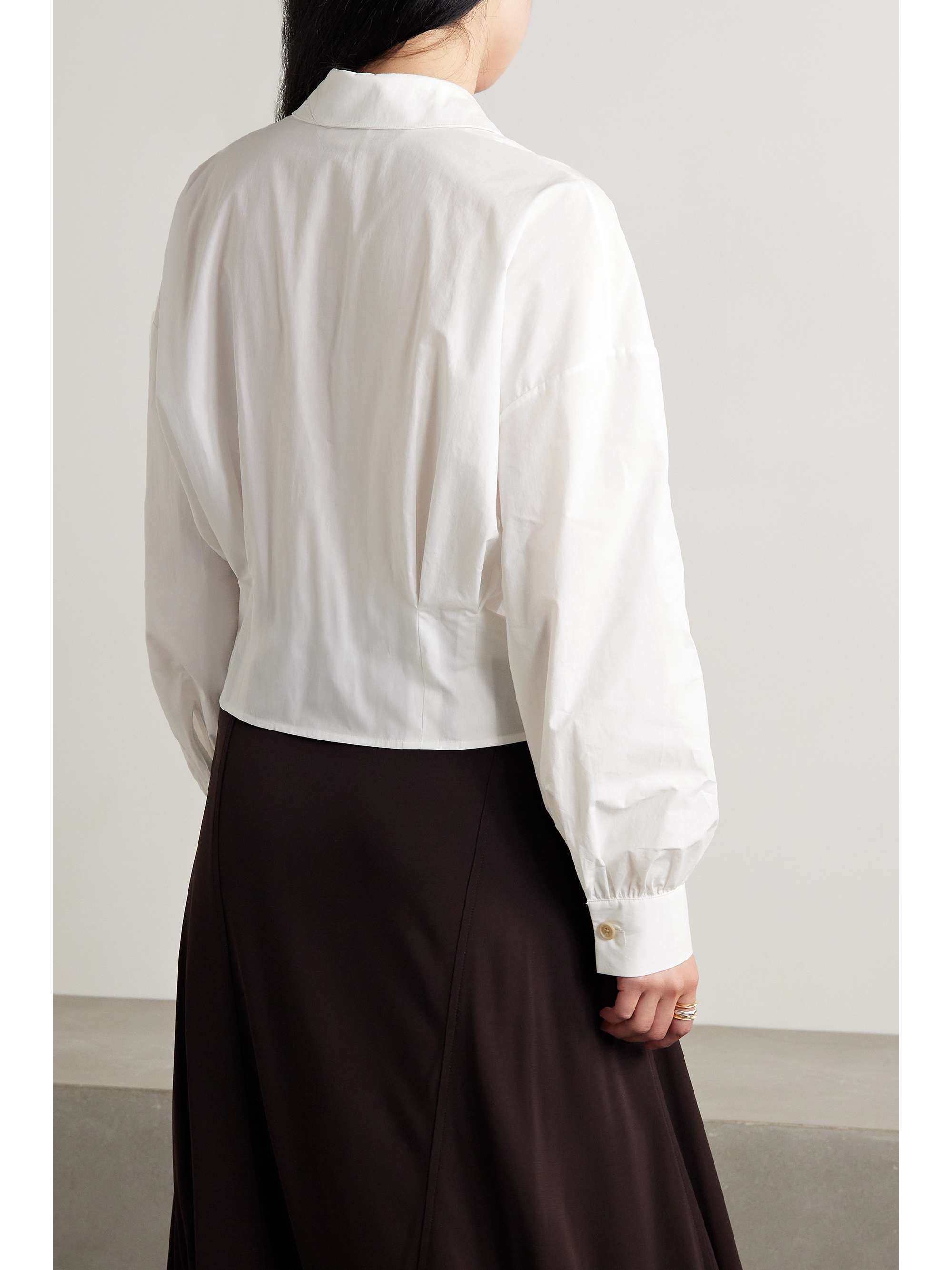 KHAITE Arwin pleated cotton-poplin shirt