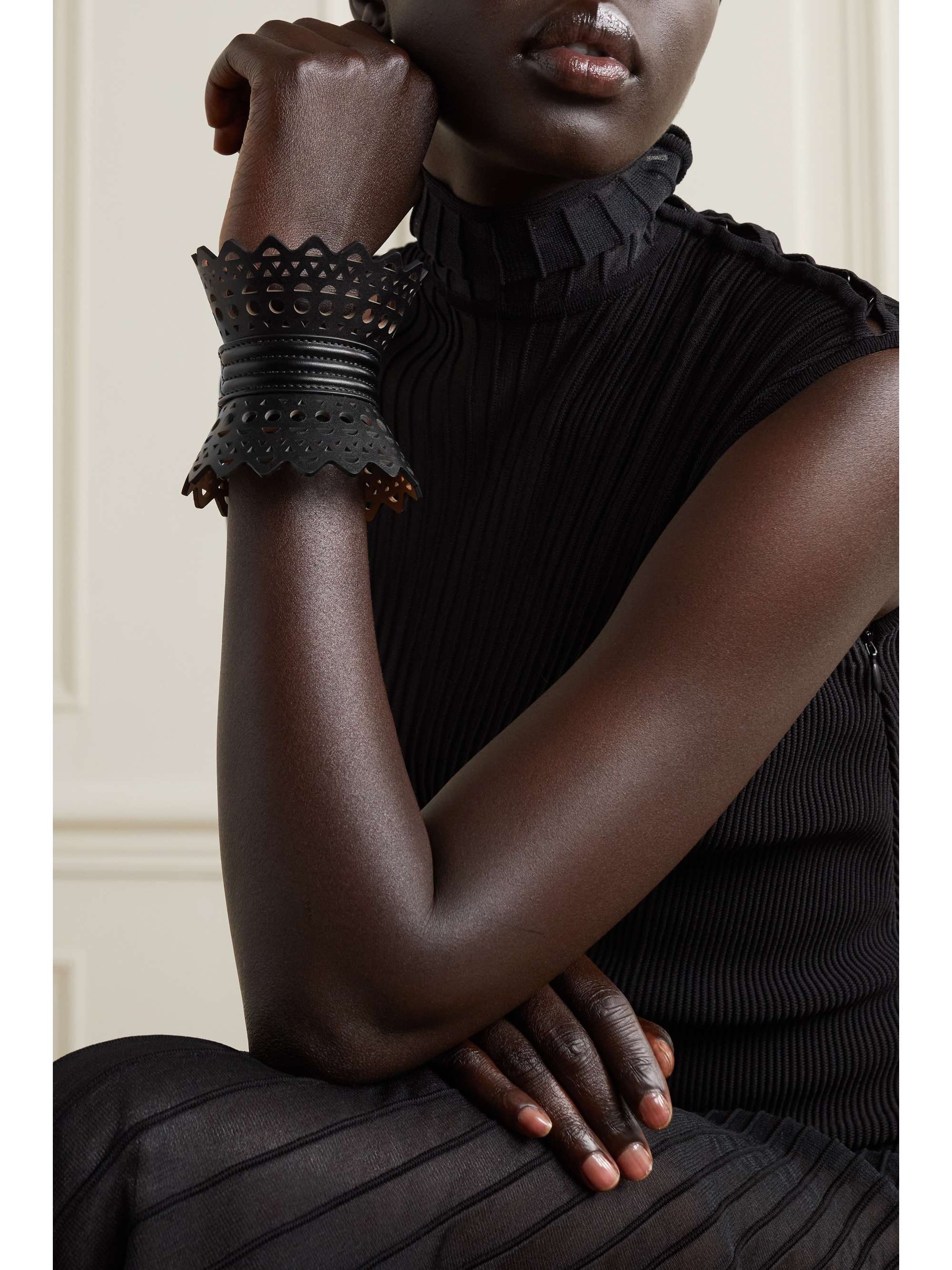 ALAÏA Buckled laser-cut leather cuff