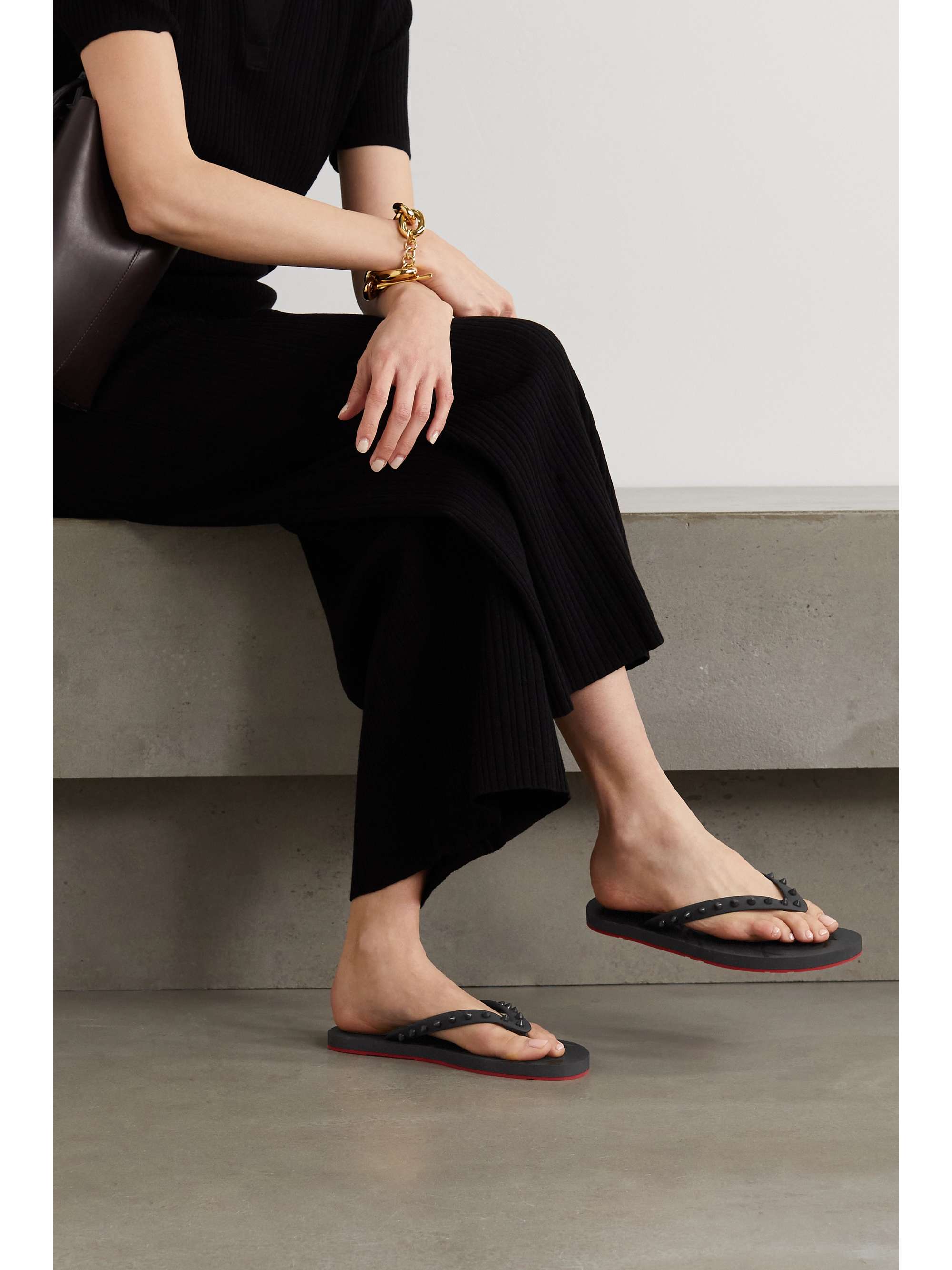 Black Donna rubber flip flops | CHRISTIAN LOUBOUTIN | NET-A-PORTER