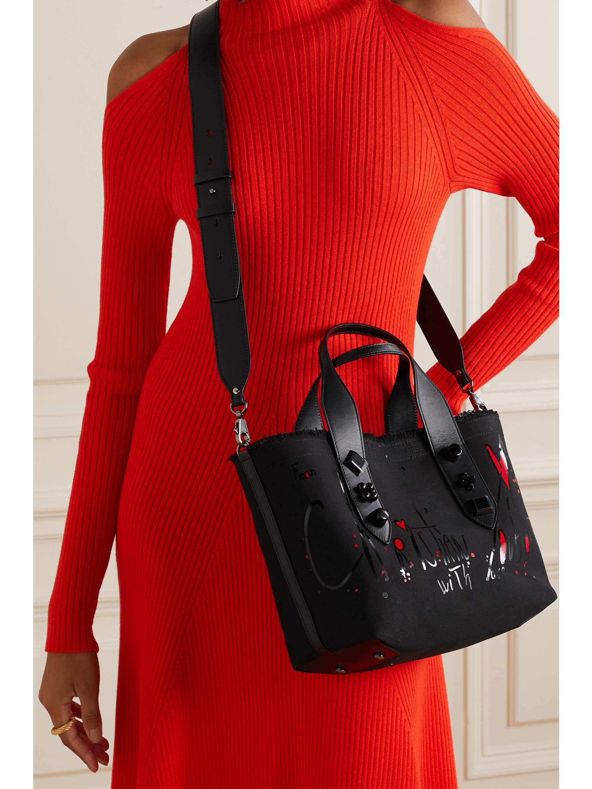 Frangibus leather-trimmed frayed printed canvas tote