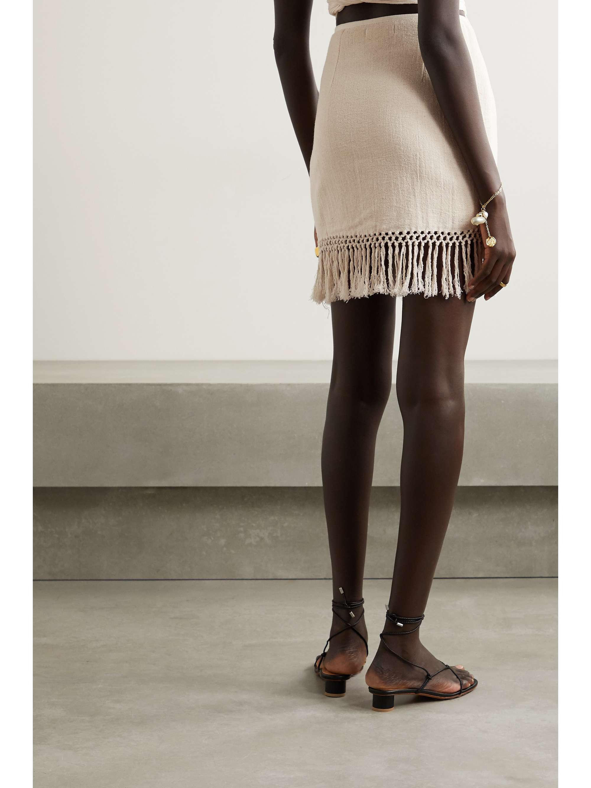 SAVANNAH MORROW THE LABEL + NET SUSTAIN The Jasmine fringed macramé ramie mini skirt