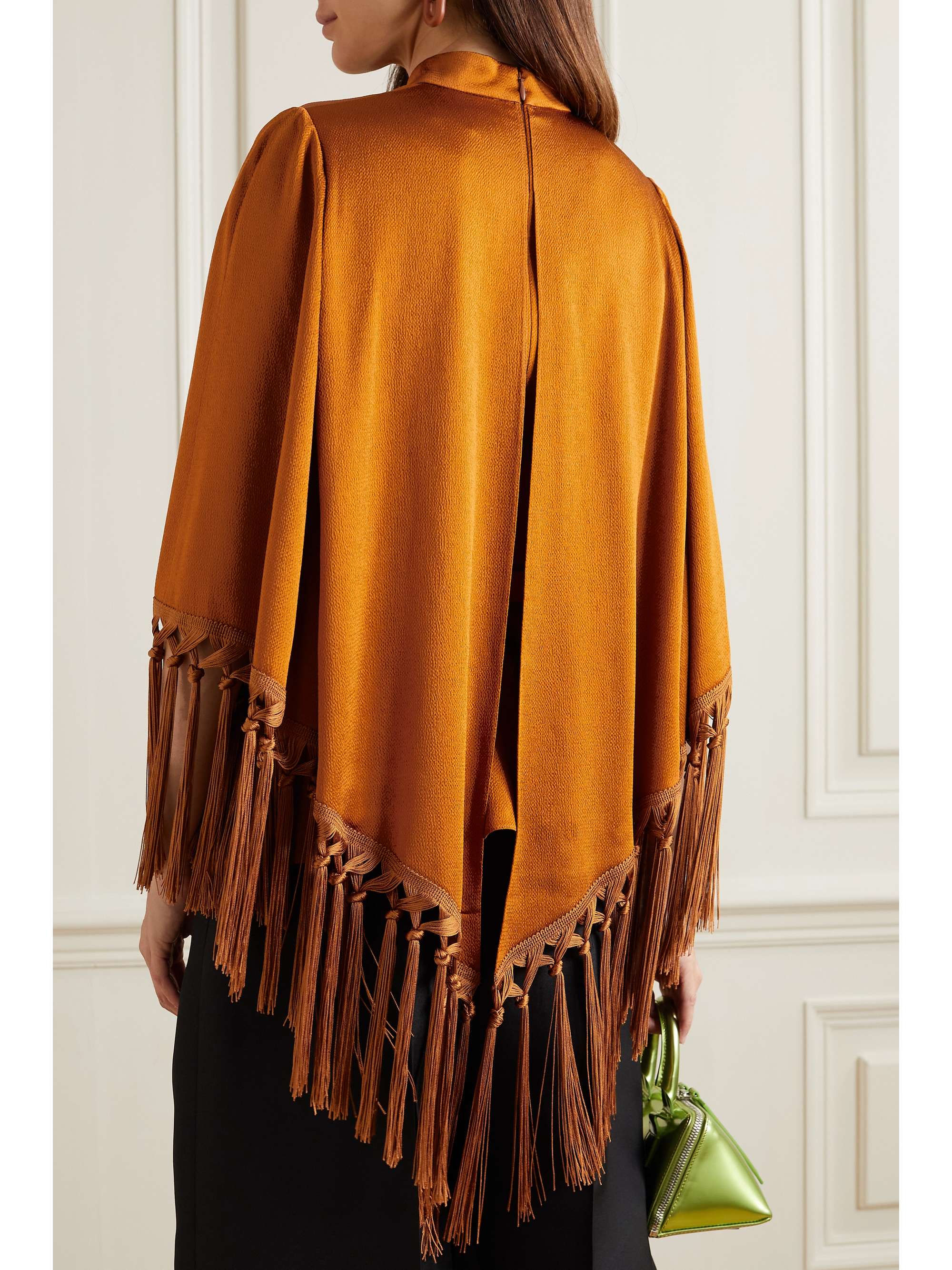ANDREW GN Cape-effect belted tasseled hammered-satin blouse