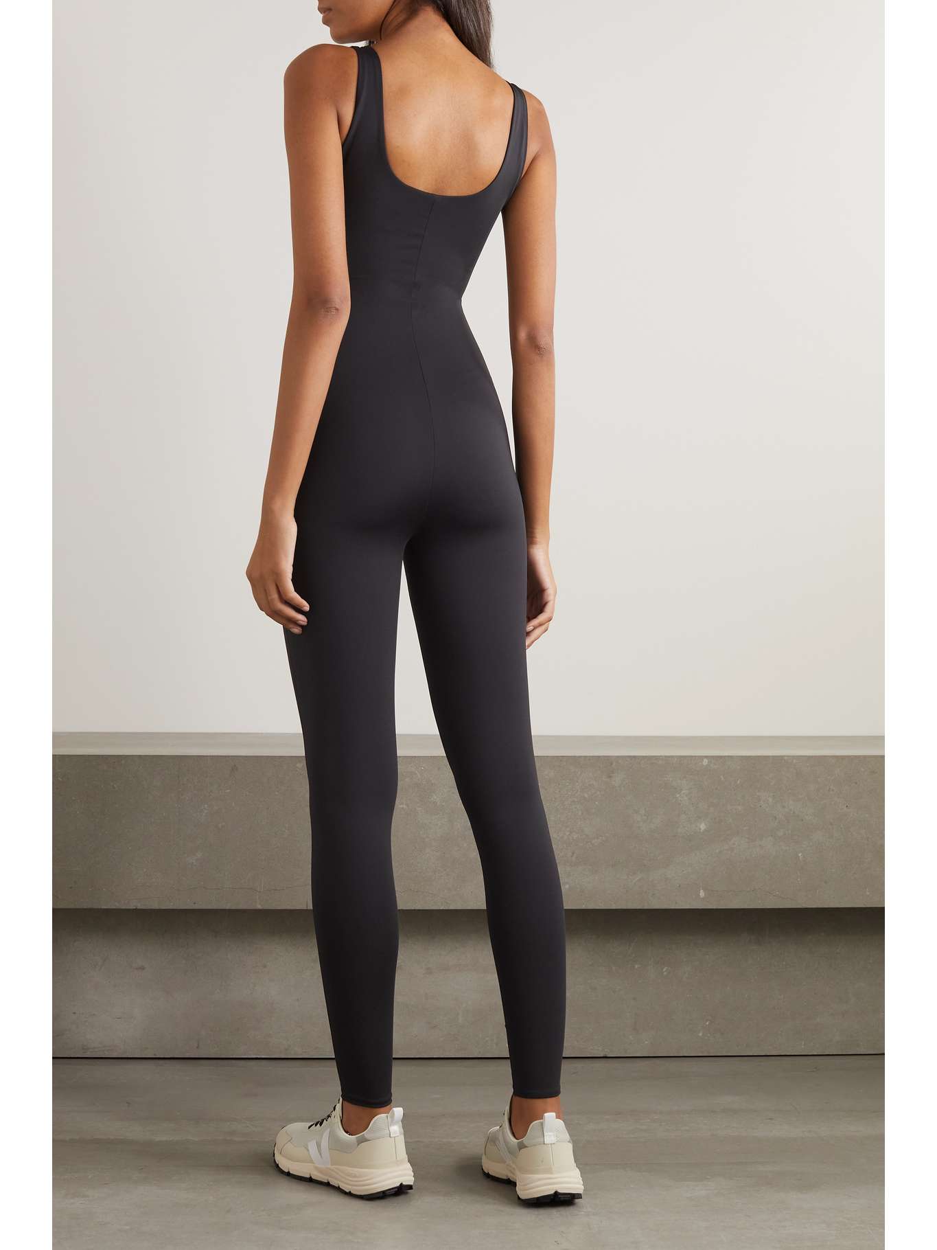 SKIMS AllInOne stretchjersey jumpsuit Onyx NETAPORTER
