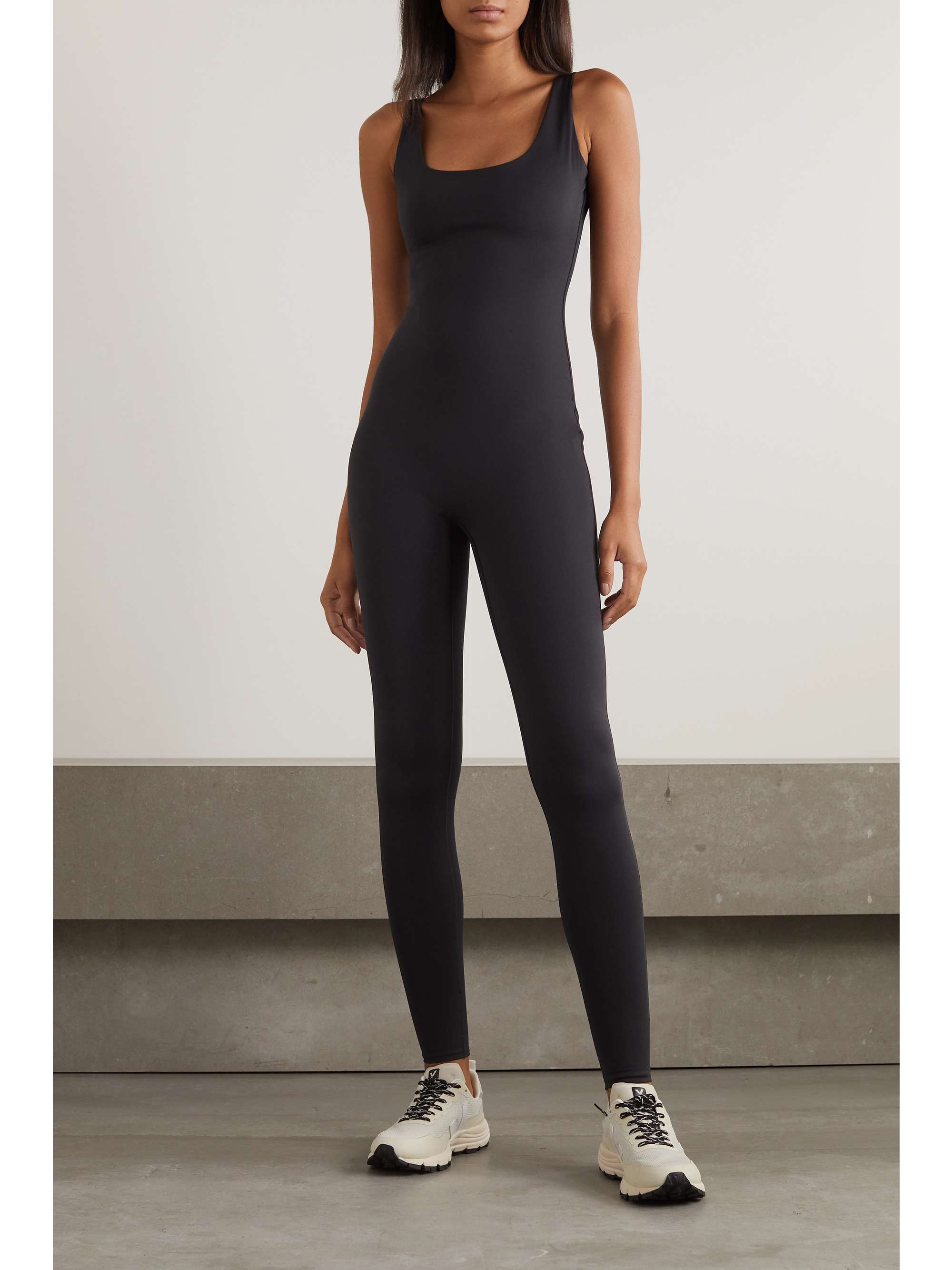 SKIMS All-In-One stretch-jersey jumpsuit - Onyx | NET-A-PORTER