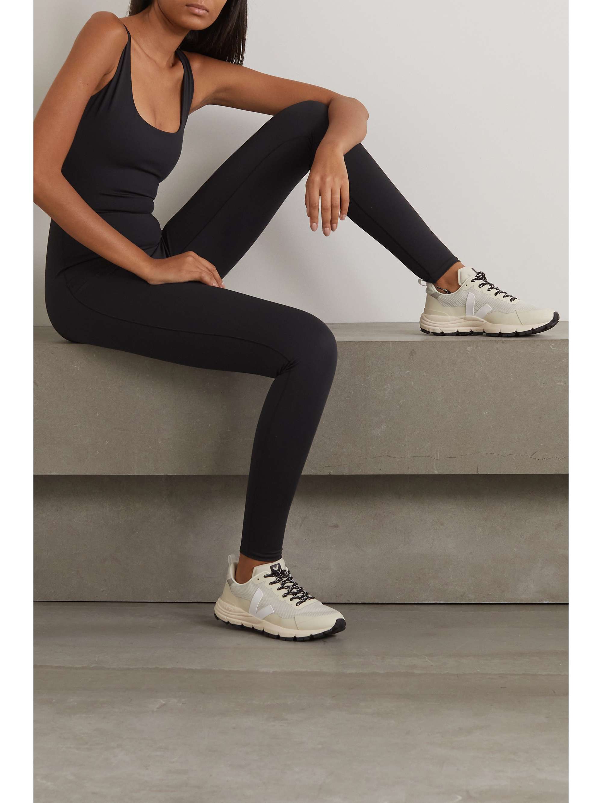 SKIMS AllInOne stretchjersey jumpsuit Onyx NETAPORTER