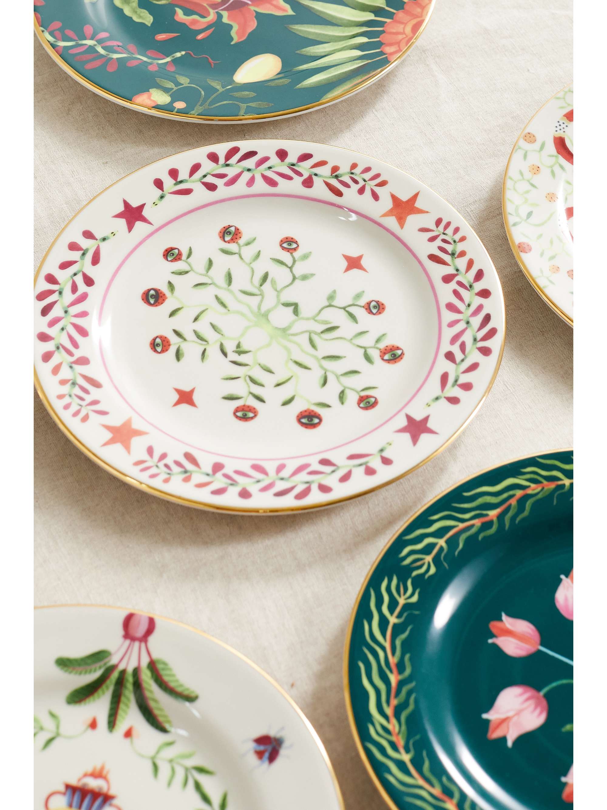 Set of six gold-plated porcelain dessert plates