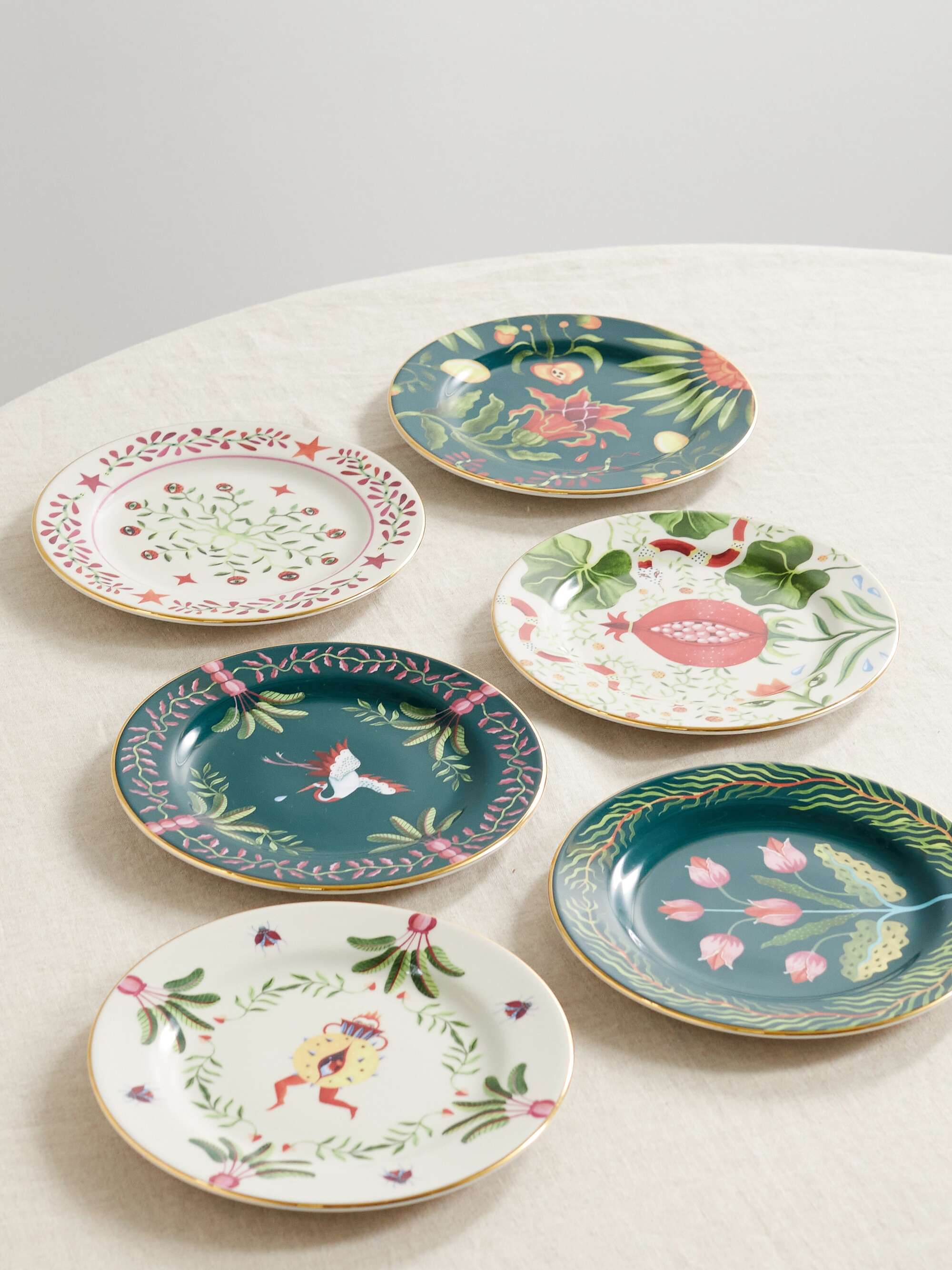 Set of six gold-plated porcelain dessert plates