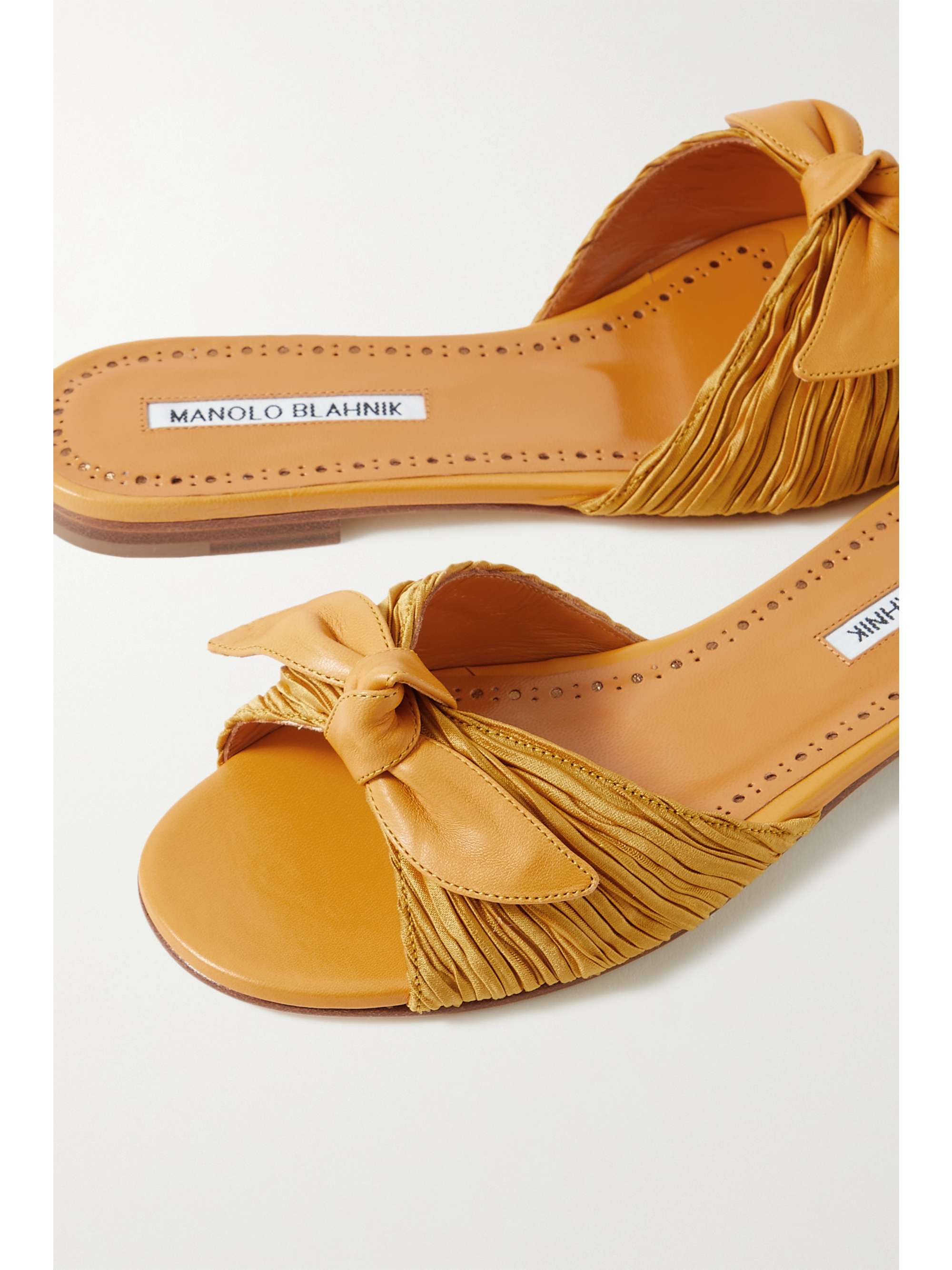 MANOLO BLAHNIK Notamu bow-detailed plissé-satin and leather slides