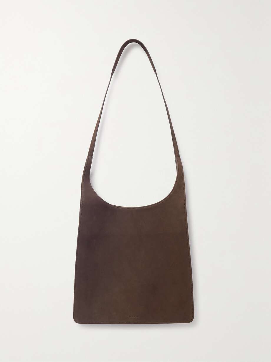 Jules nubuck shoulder bag by The Row, available on net-a-porter.com for $2013.64 Kendall Jenner Bags Exact Product 