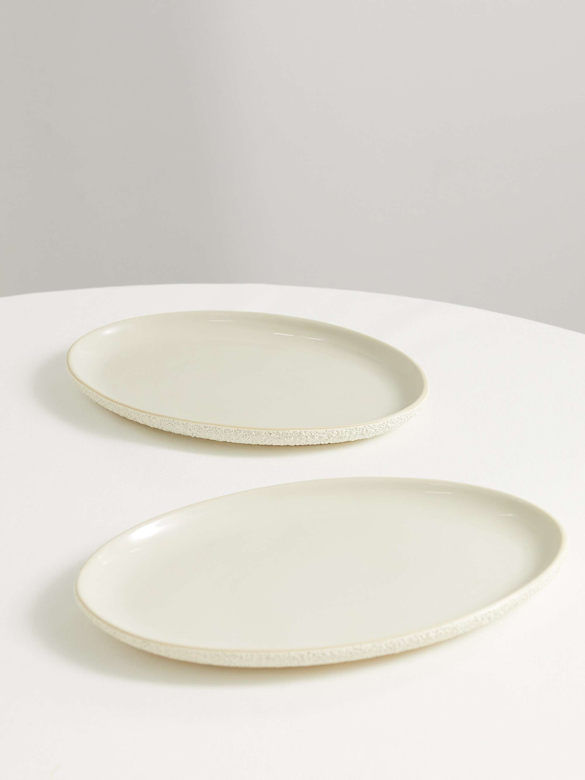 Set of two glazed ceramic dinner plates