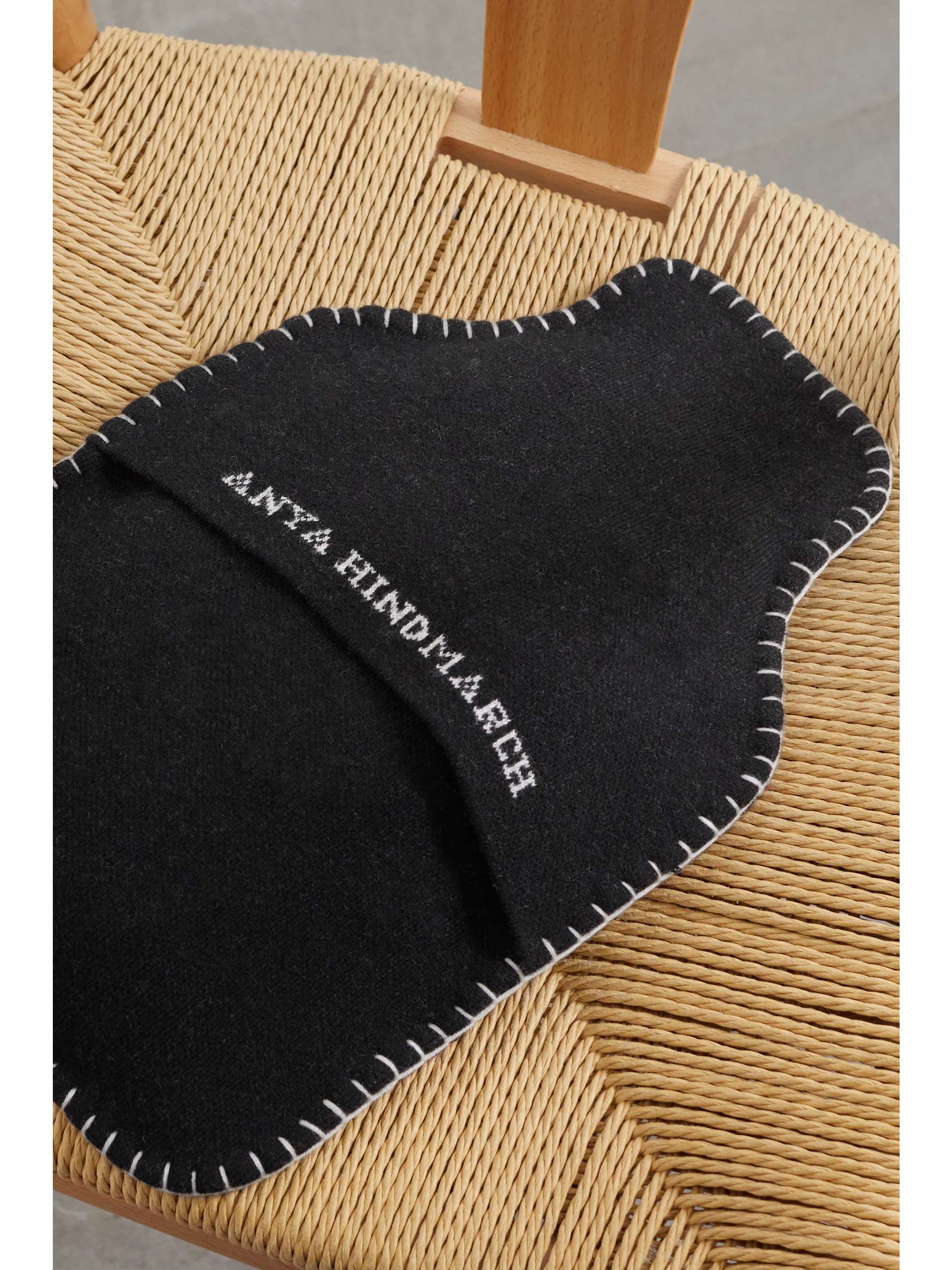 Black Eyes intarsia wool-blend hot water bottle cover | ANYA HINDMARCH