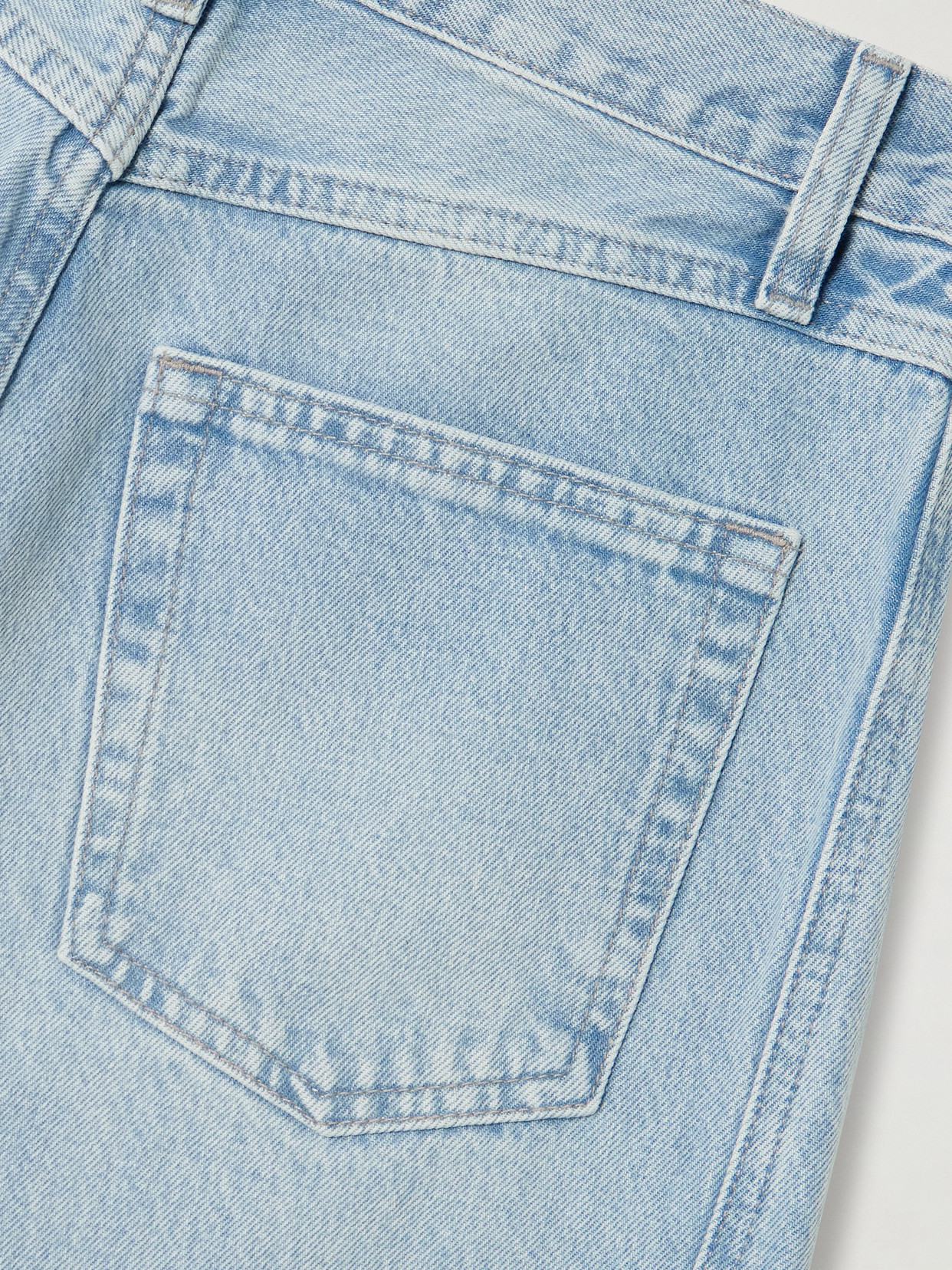 FRAME THE TWISTED PANELED HIGH-RISE STRAIGHT-LEG JEANS