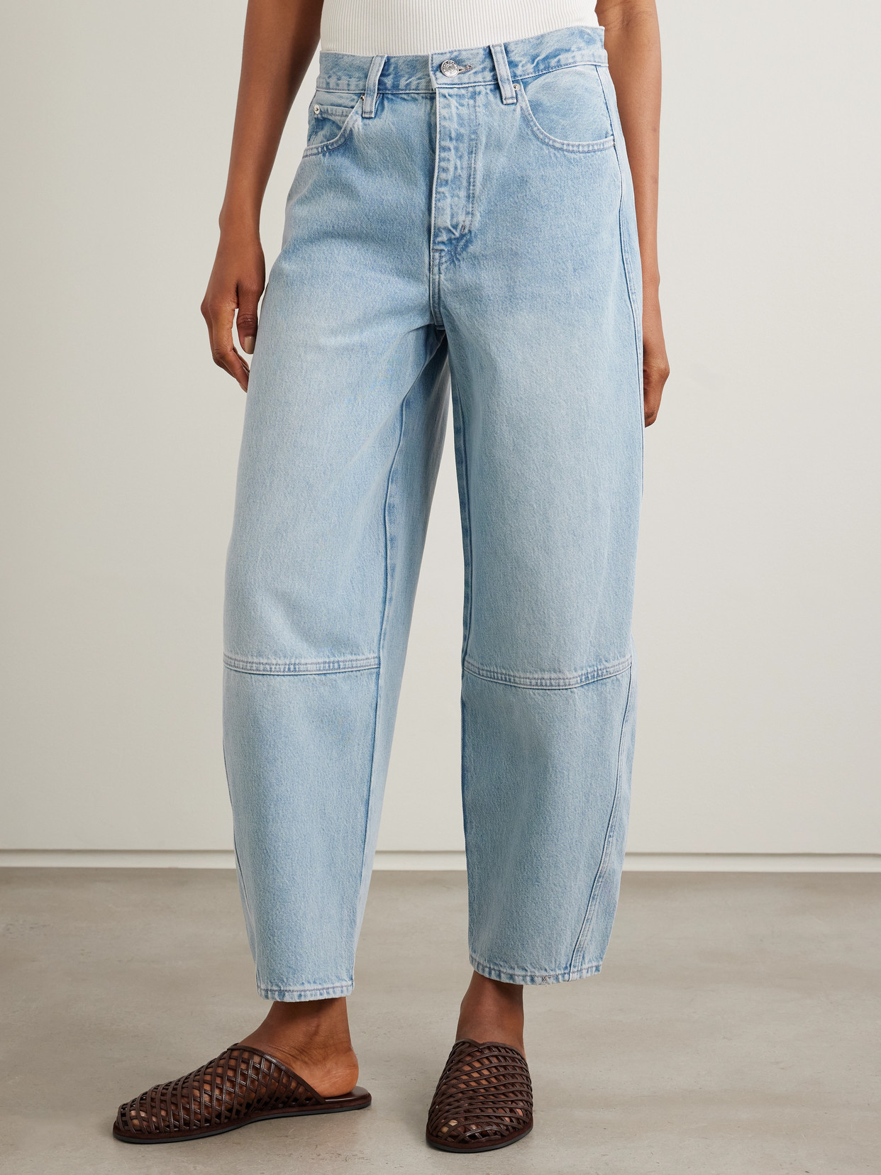 FRAME THE TWISTED PANELED HIGH-RISE STRAIGHT-LEG JEANS