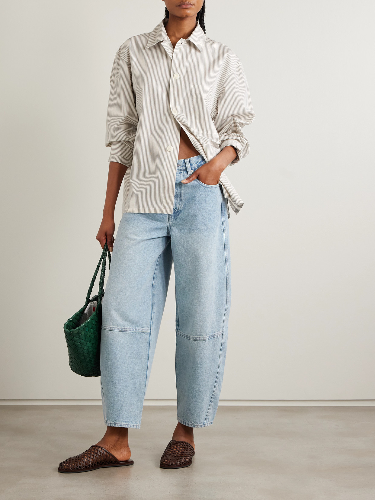 FRAME THE TWISTED PANELED HIGH-RISE STRAIGHT-LEG JEANS