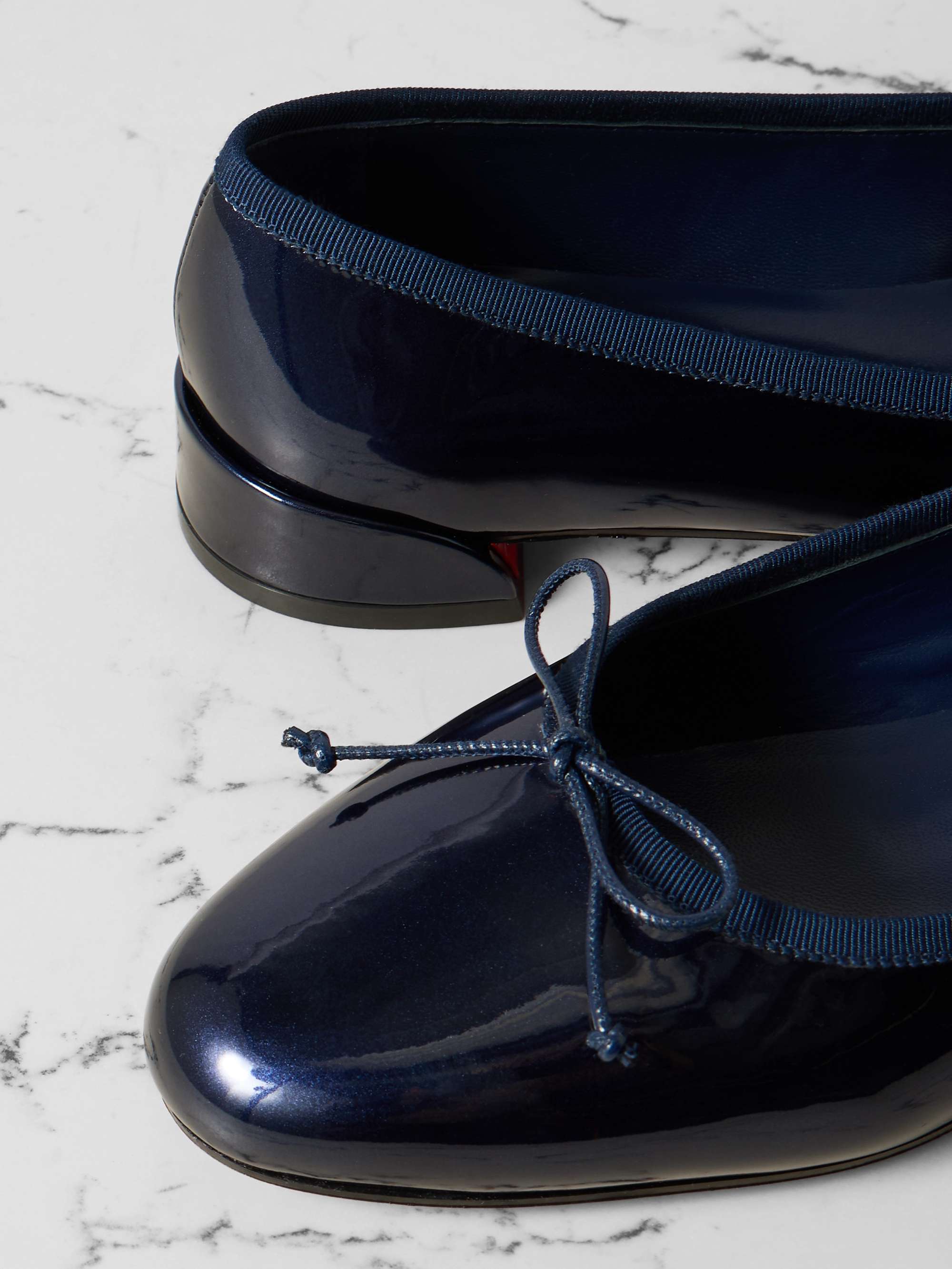 CHRISTIAN LOUBOUTIN 