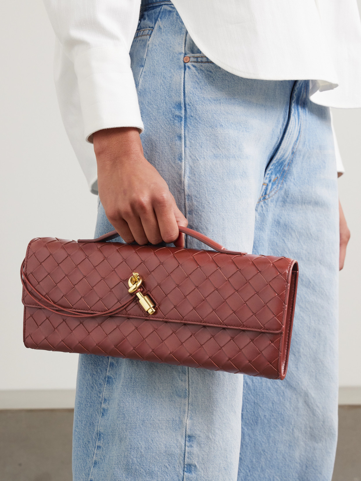 Bottega Veneta Andiamo Knot Intrecciato Leather Clutch In Red