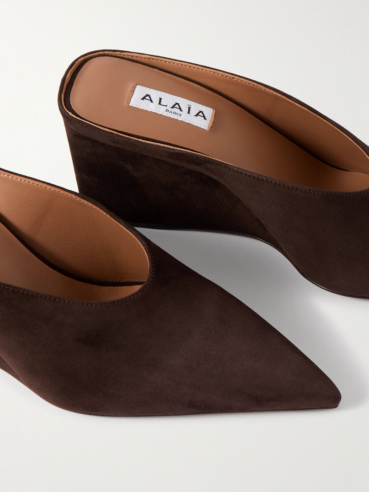 ALAÏA 75 SUEDE POINT-TOE WEDGE MULES