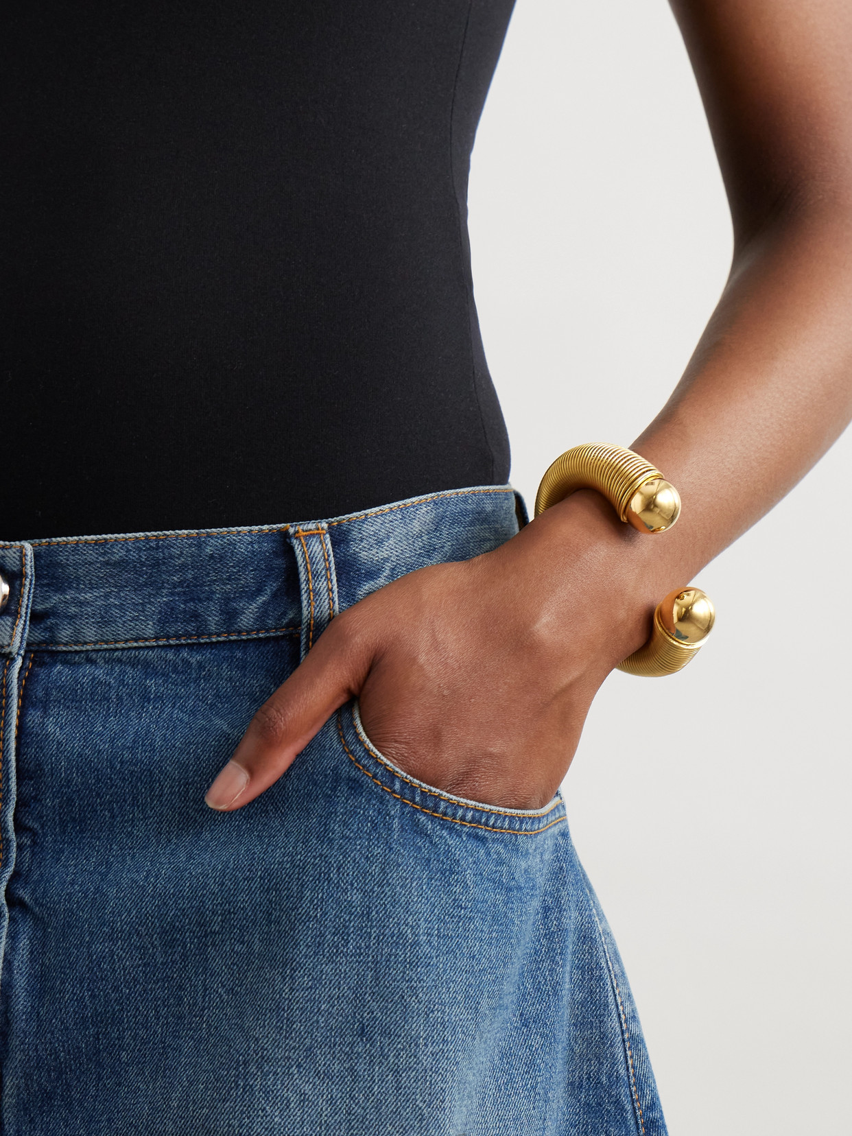 Alaïa Sphere Gold-tone Cuff In Gold
