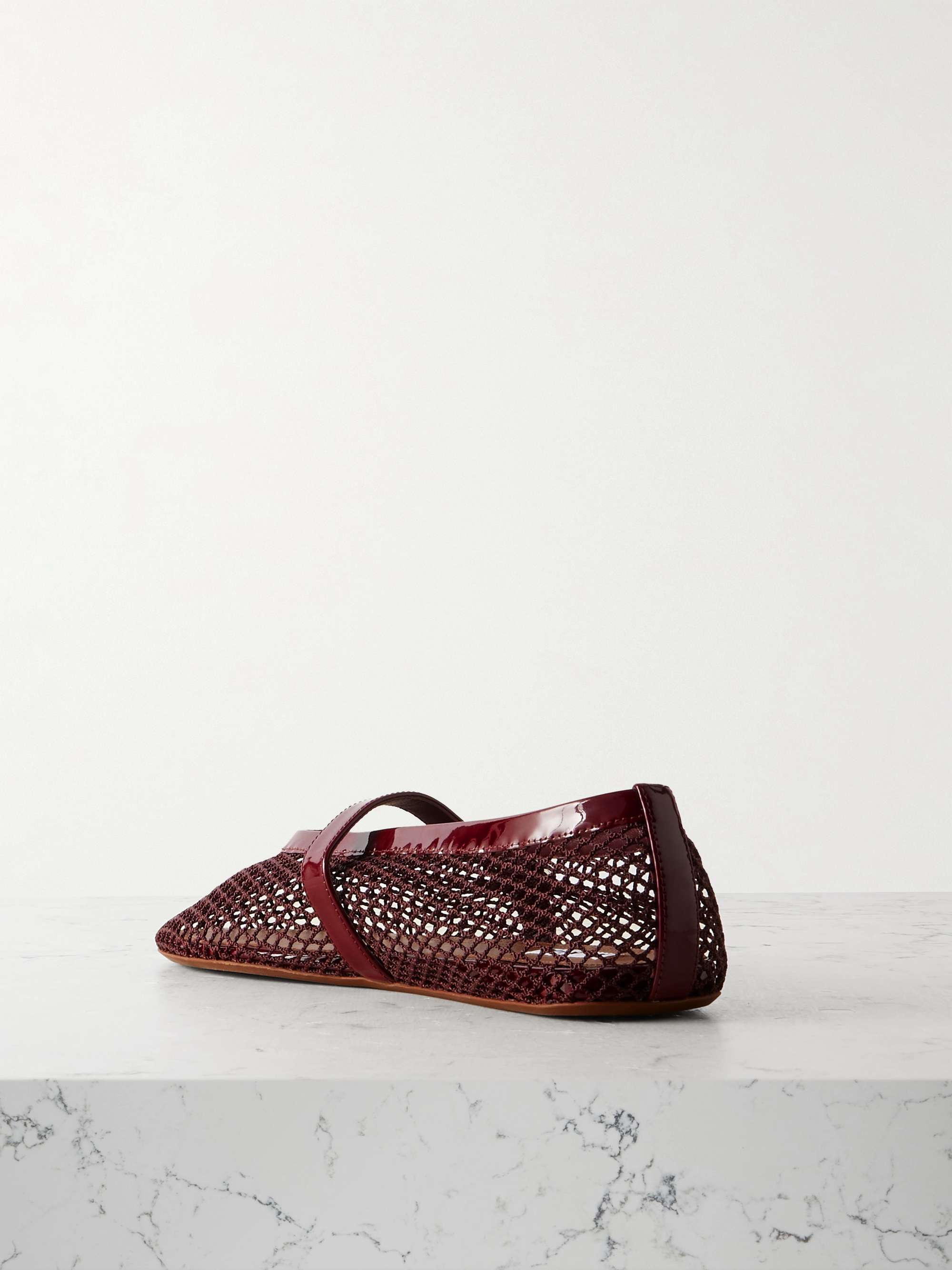 ALAÏA Patent leather-trimmed mesh ballet flats