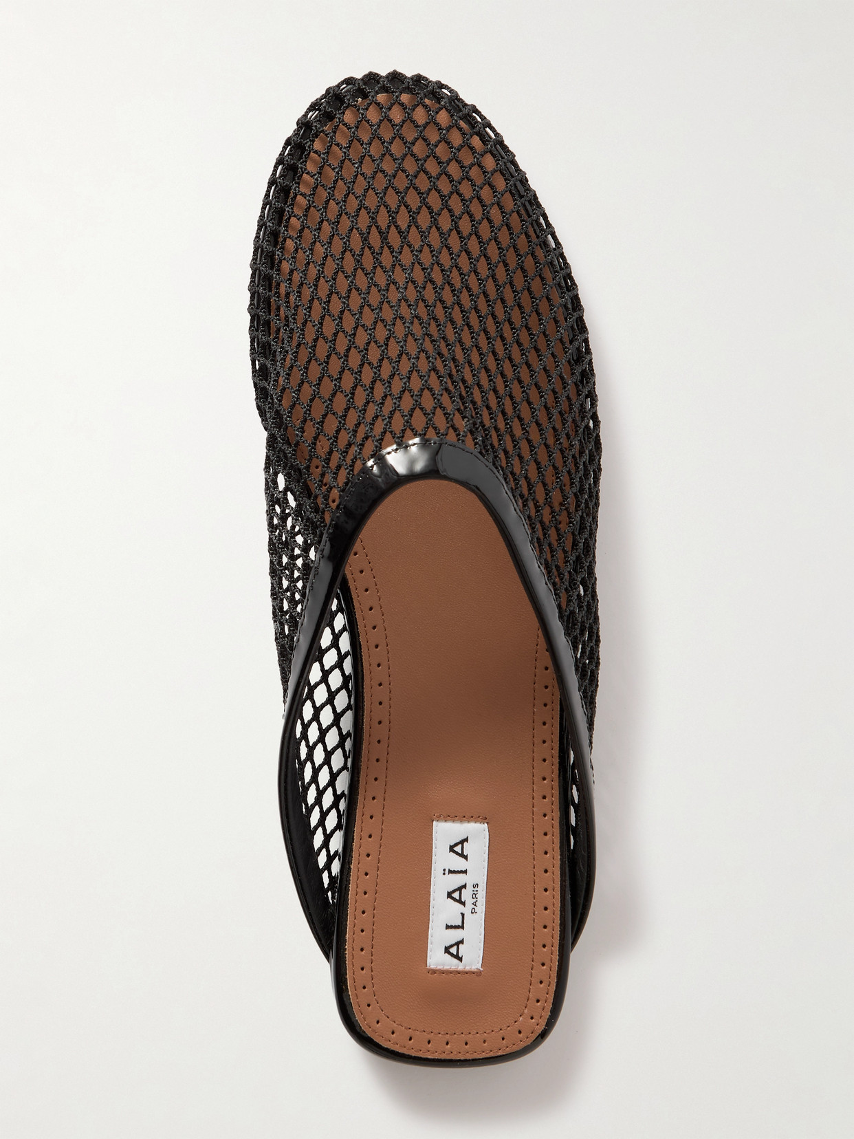 ALAÏA LEATHER-TRIMMED FISHNET MULES