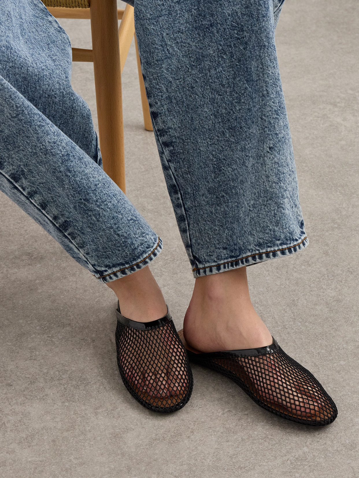 ALAÏA LEATHER-TRIMMED FISHNET MULES