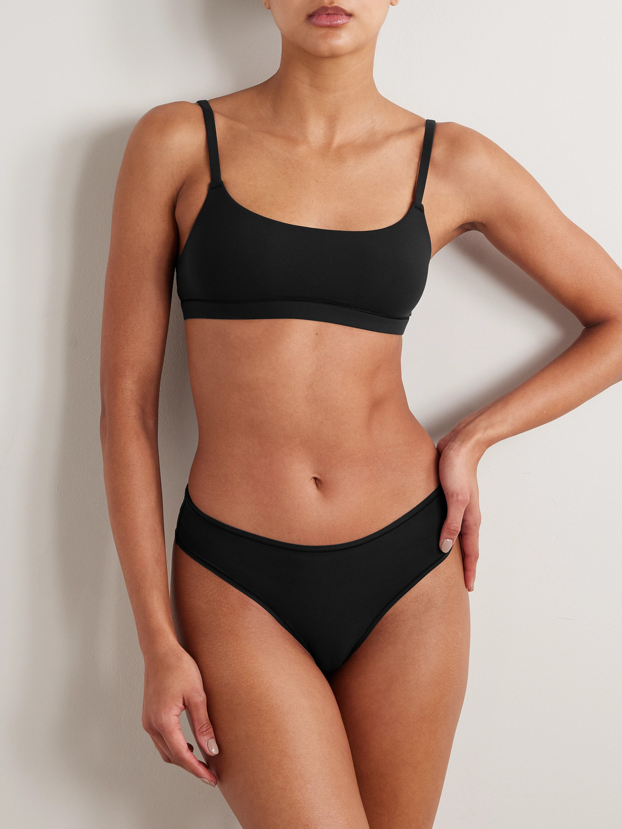 Skims Smoothing Mid-rise Stretch-woven Thong In Black