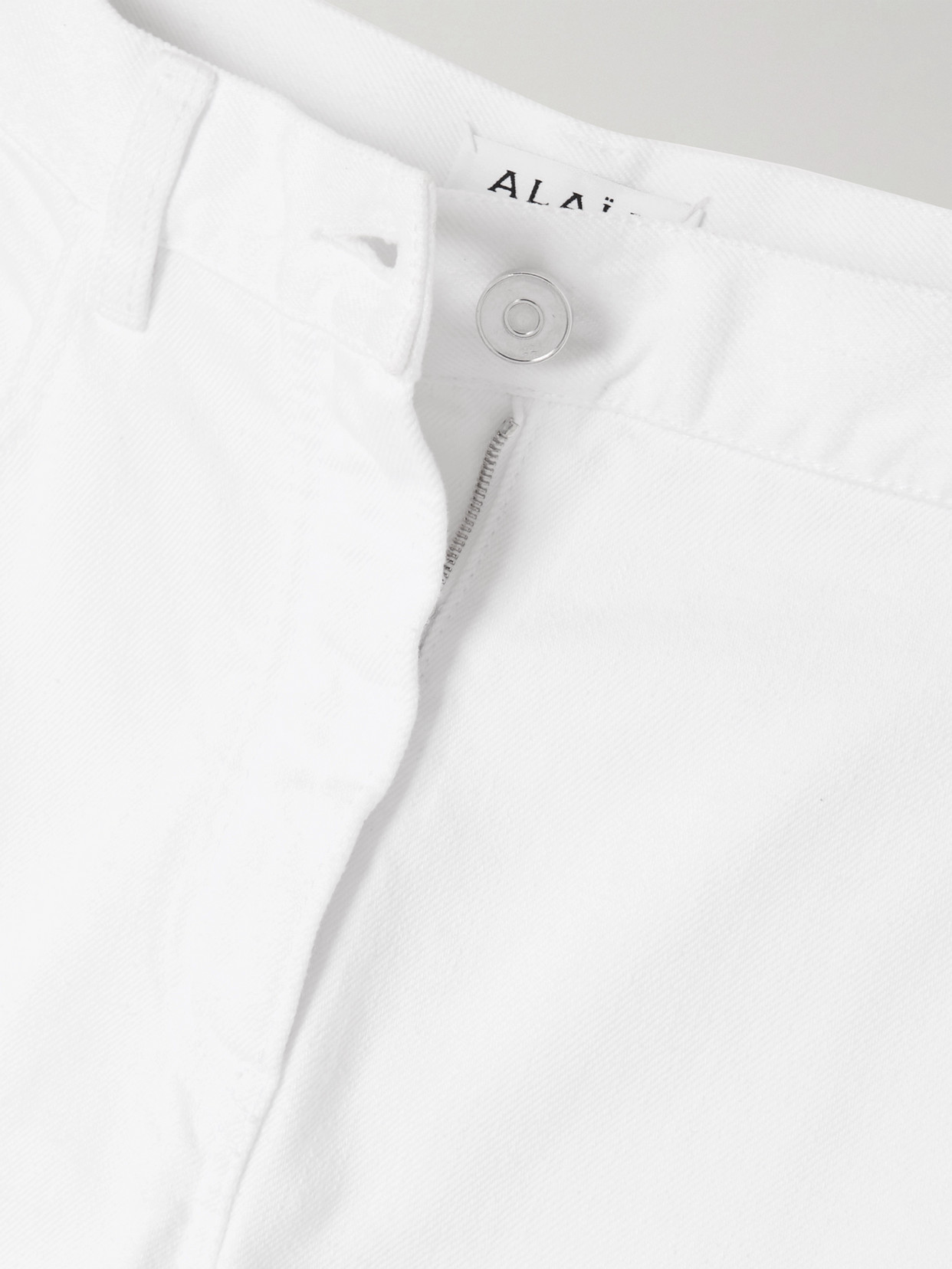 Shop Alaïa Mid-rise Barrel-leg Jeans