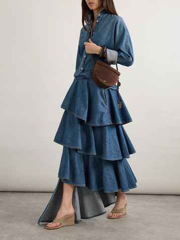 Alaïa Asymmetric ruffled tiered denim skirt