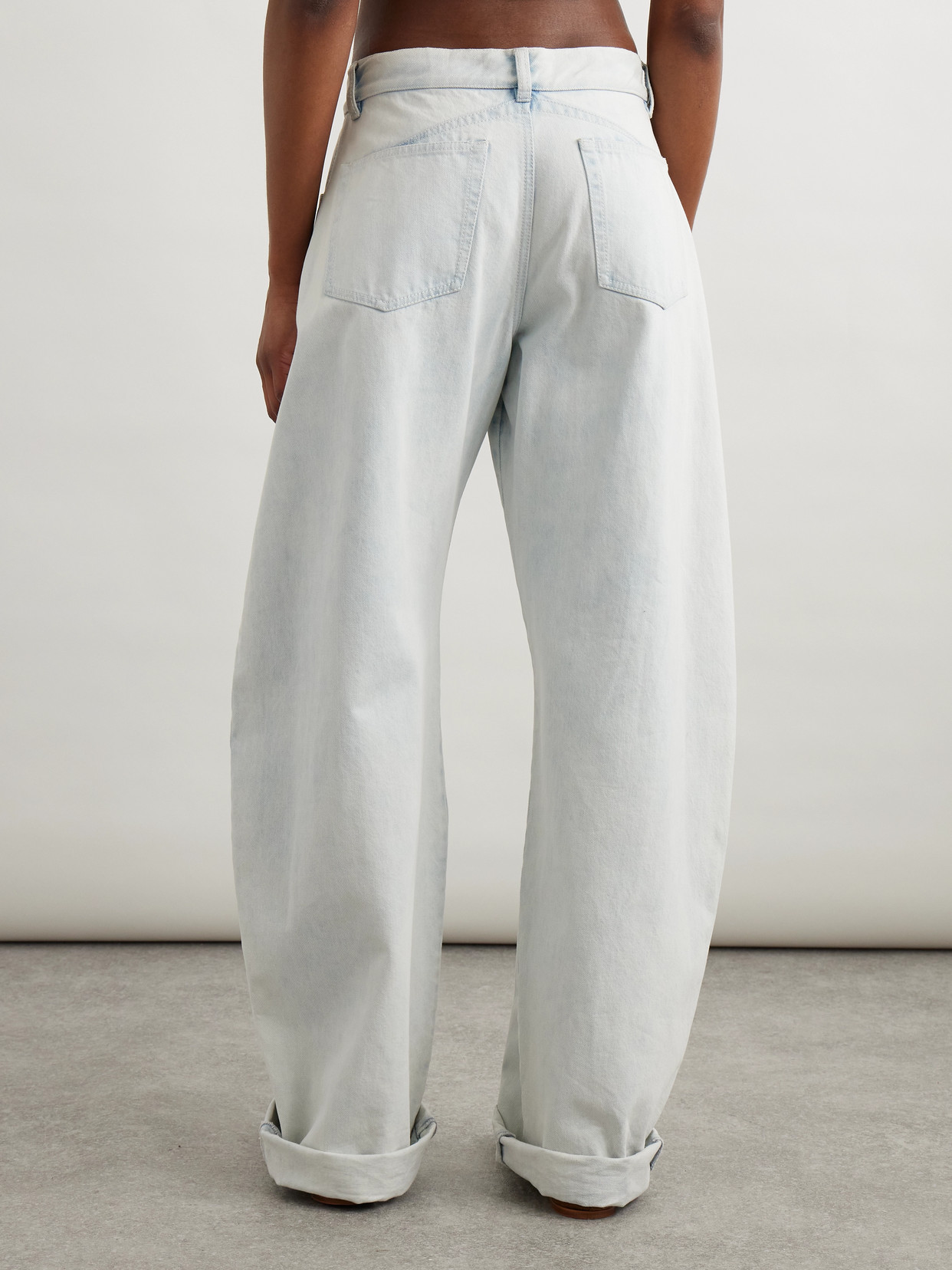 ALAÏA LOW-RISE BARREL-LEG JEANS 