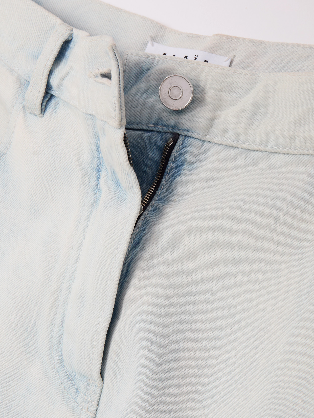 Shop Alaïa Low-rise Barrel-leg Jeans