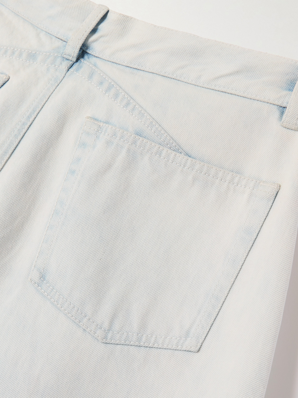 ALAÏA LOW-RISE BARREL-LEG JEANS 