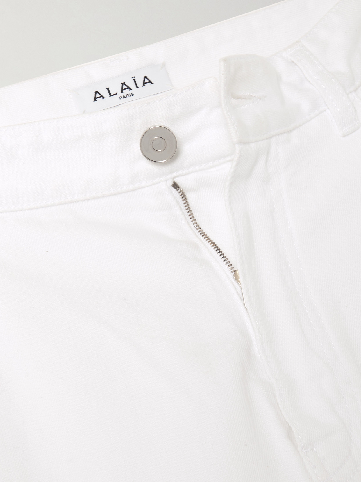 Shop Alaïa Ruffled Mid-rise Wide-leg Jeans