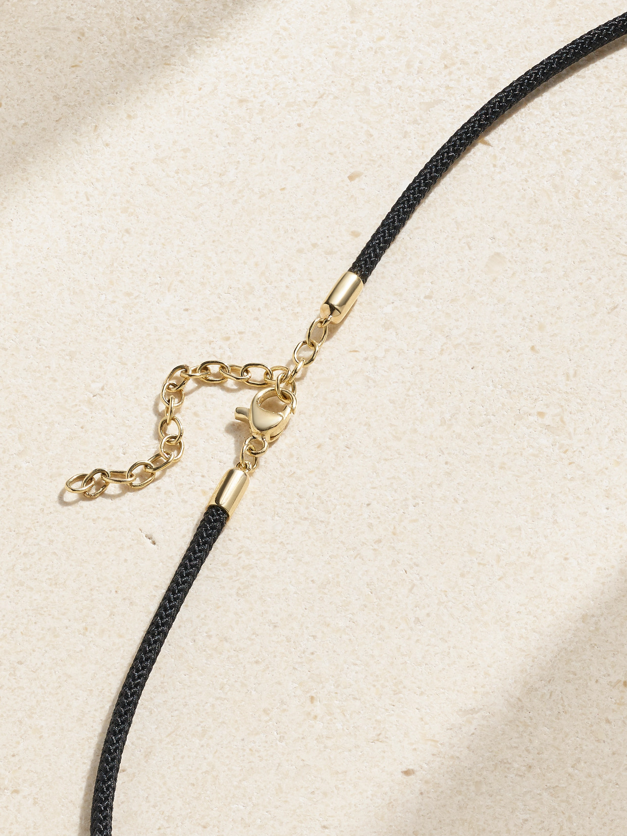 STONE AND STRAND LARGE PEACE 14-KARAT GOLD AND CORD CHOKER