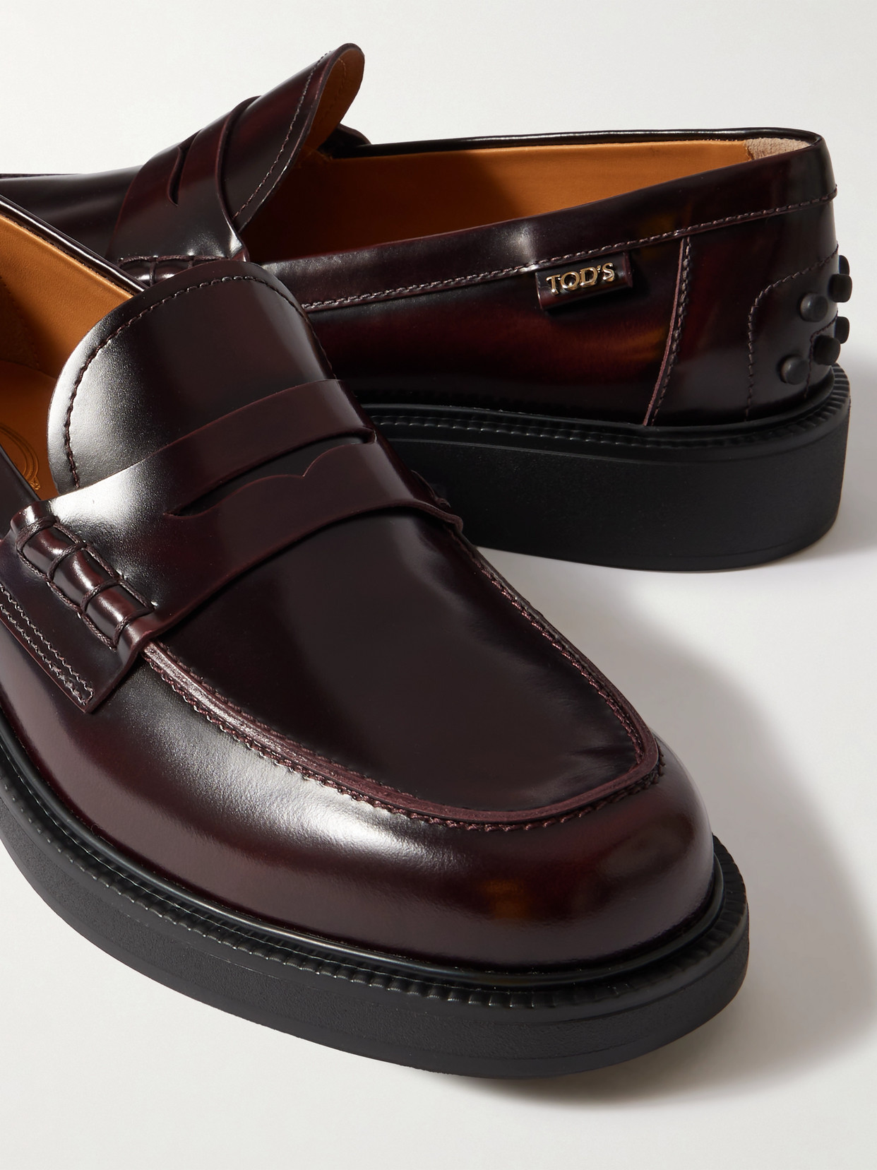 Tod's Glossed-leather Loafers In Brown