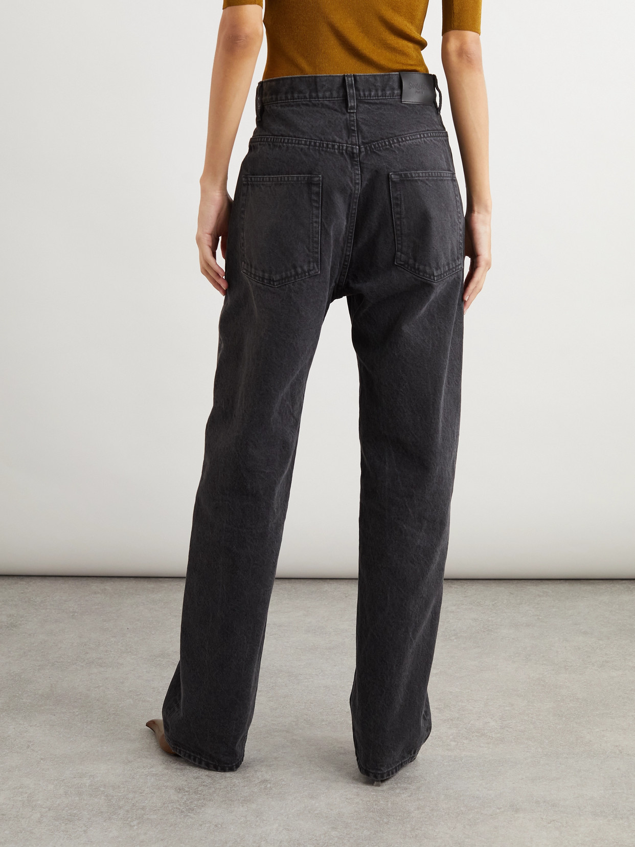 Saint Laurent High-rise Tapered Jeans In Black