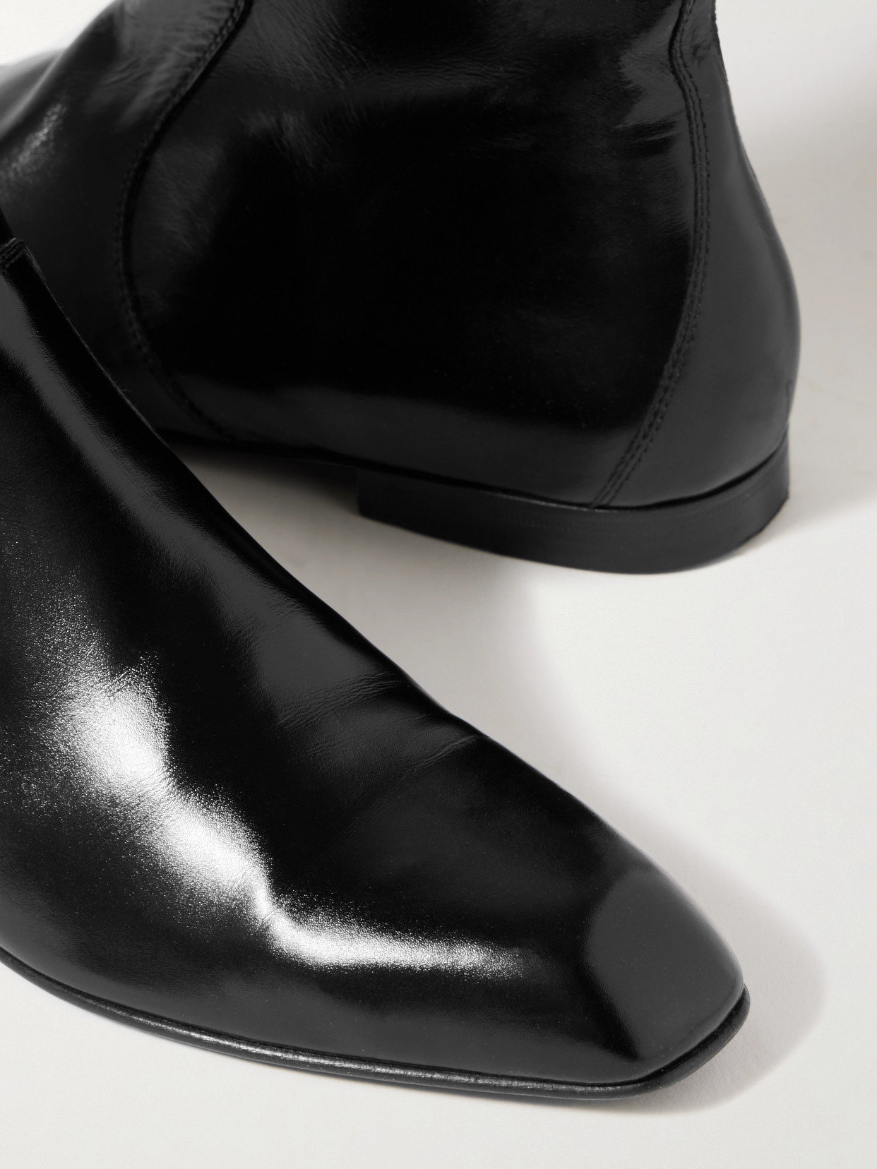 Khaite Colt Glossed-leather Ankle Boots In Black