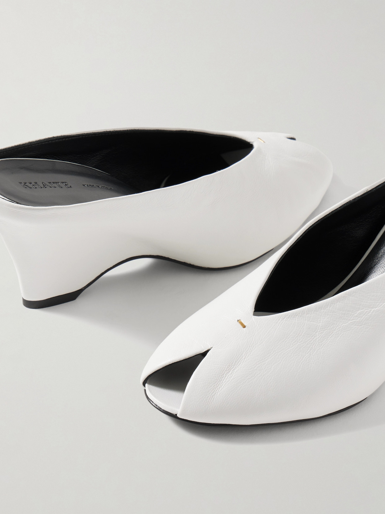 Khaite Cloak 75 Leather Peep-toe Wedge Mules In White