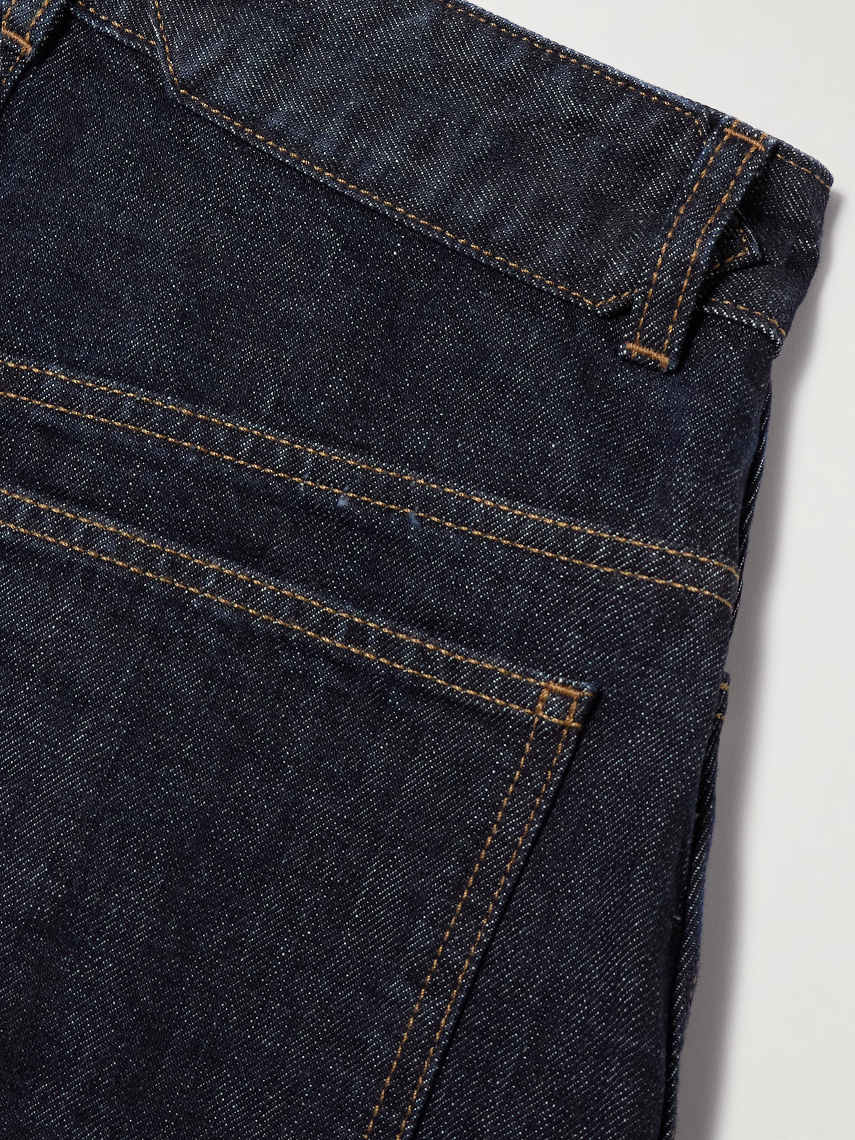 Jacquemus Curved Cut Ovalo Denim Pants In Blue