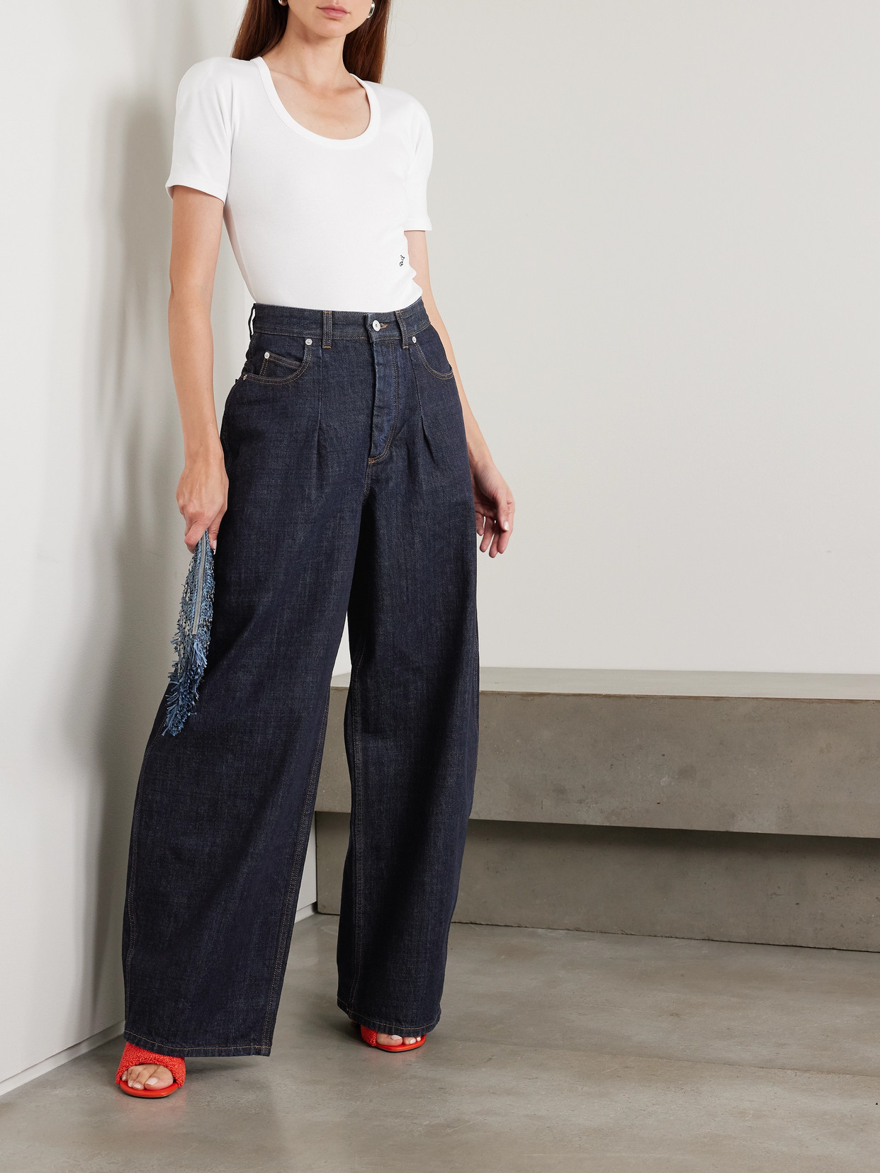 Jacquemus Curved Cut Ovalo Denim Pants In Blue