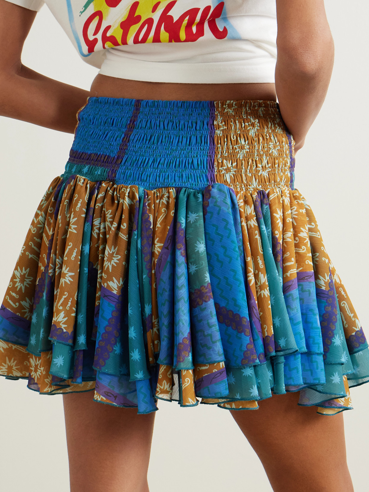 Donde Esteban Estrellitas Tiered Smocked Printed Silk-chiffon Mini Skirt
