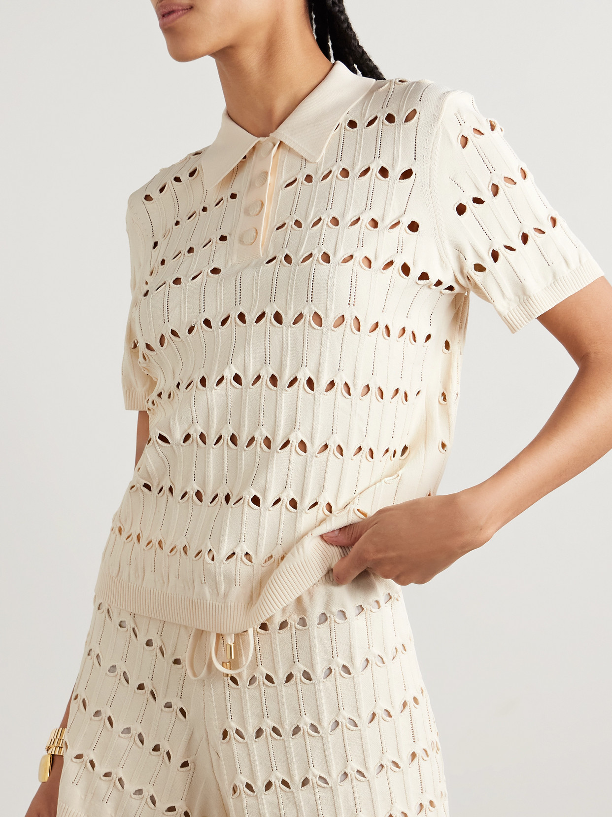 Zimmermann Rhiannon Cutout Pointelle-knit Polo Shirt In Cream