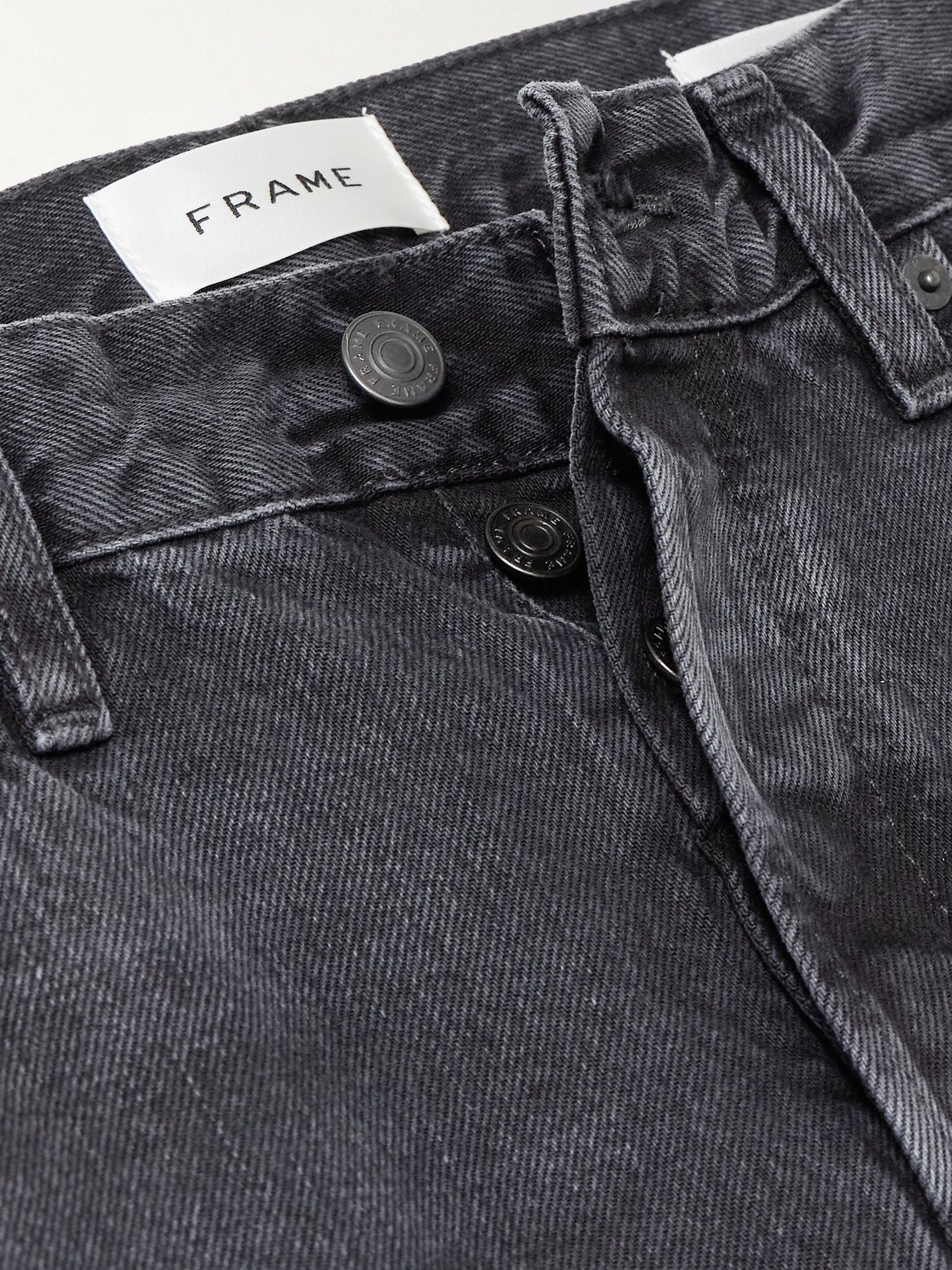 Frame The Loose Low-rise Wide-leg Jeans In Black