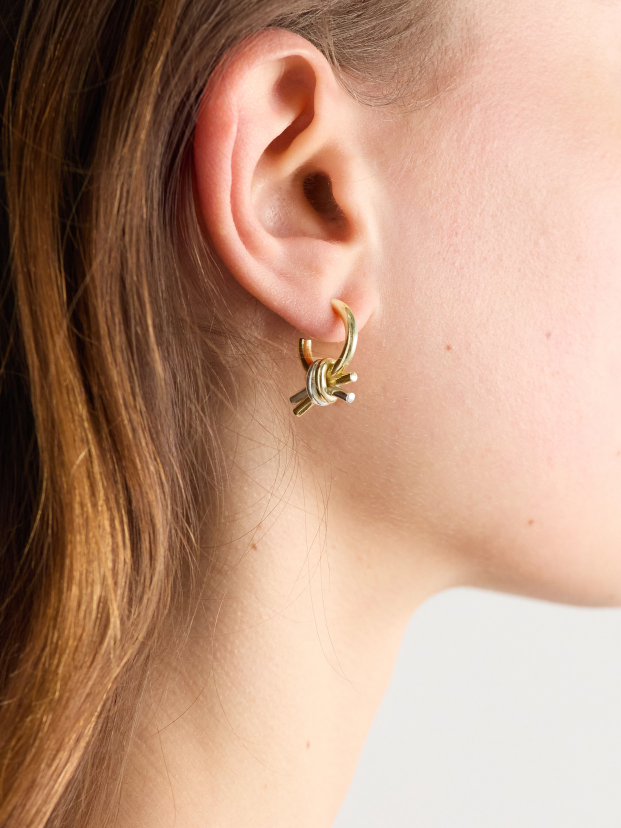 Bottega Veneta Knotted Hoop Earrings In Mixed Metals In Gold