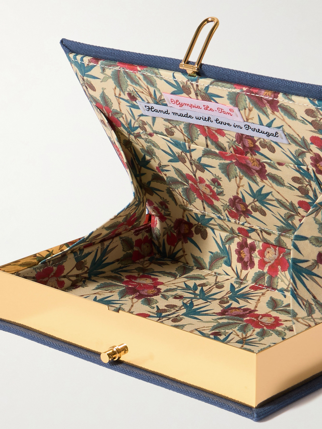 Olympia Le-tan The Thrill Of A Romance Book Embroidered Appliquéd Canvas Clutch In Blue