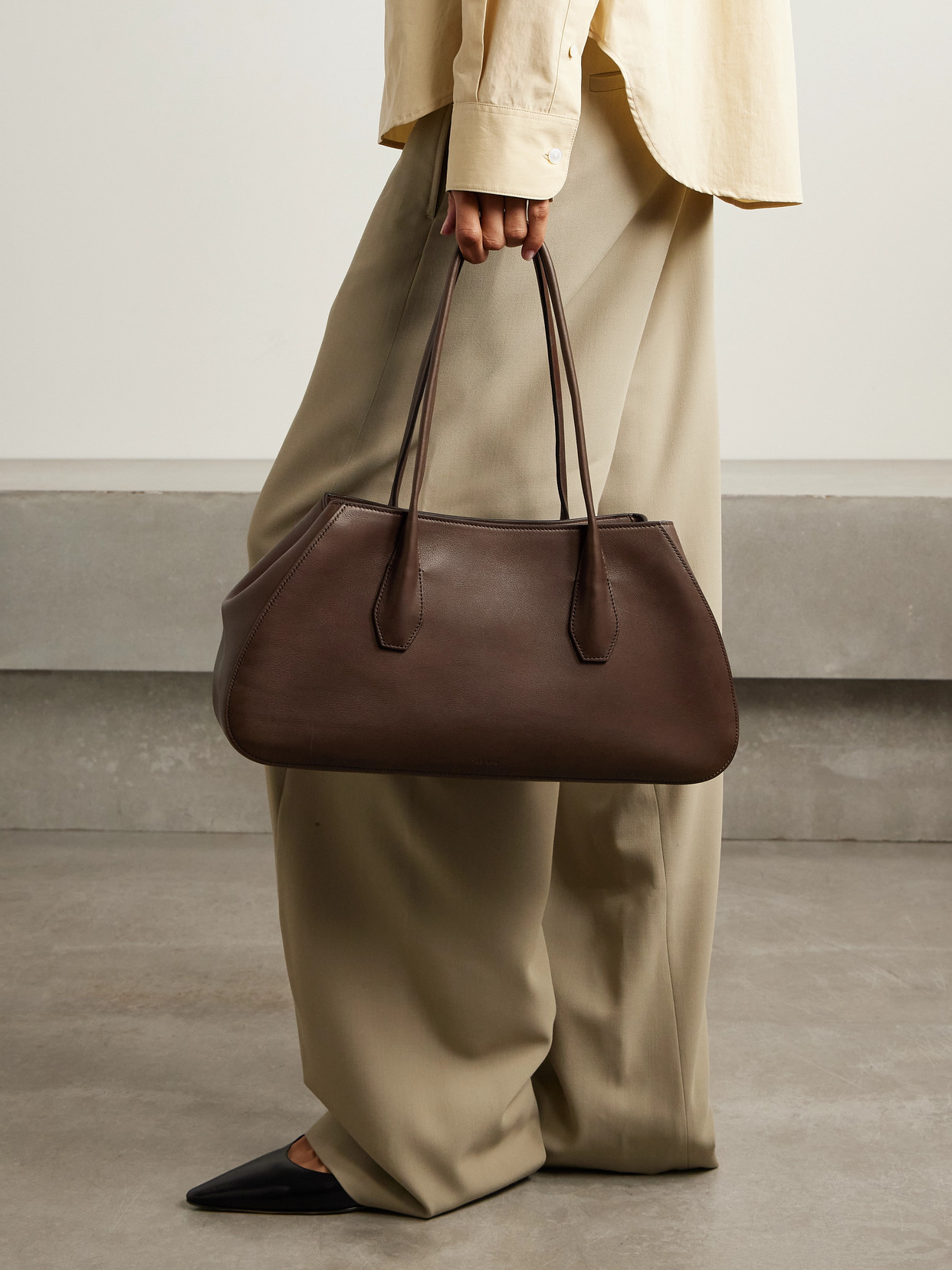 The Row Alger Leather Shoulder Bag In Brown